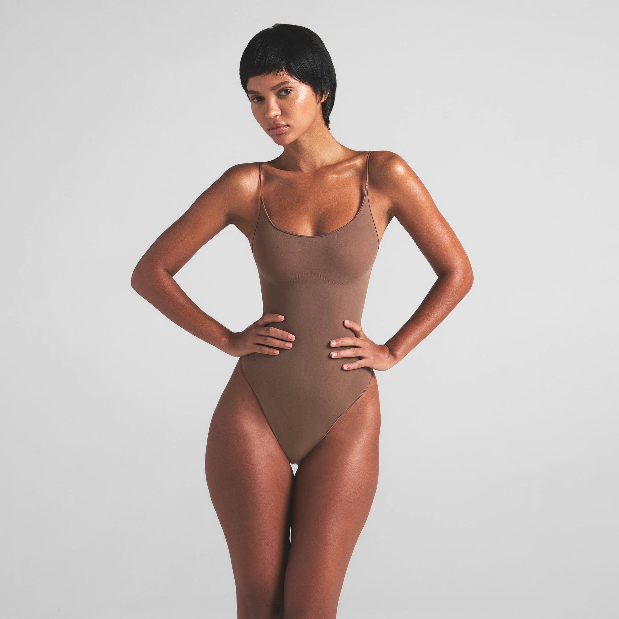 SHEER SEAMLESS THONG BODYSUIT | JASPER ON A MODEL FRONT VIEW | FOCUS: 0.0, 1.0, 0.9