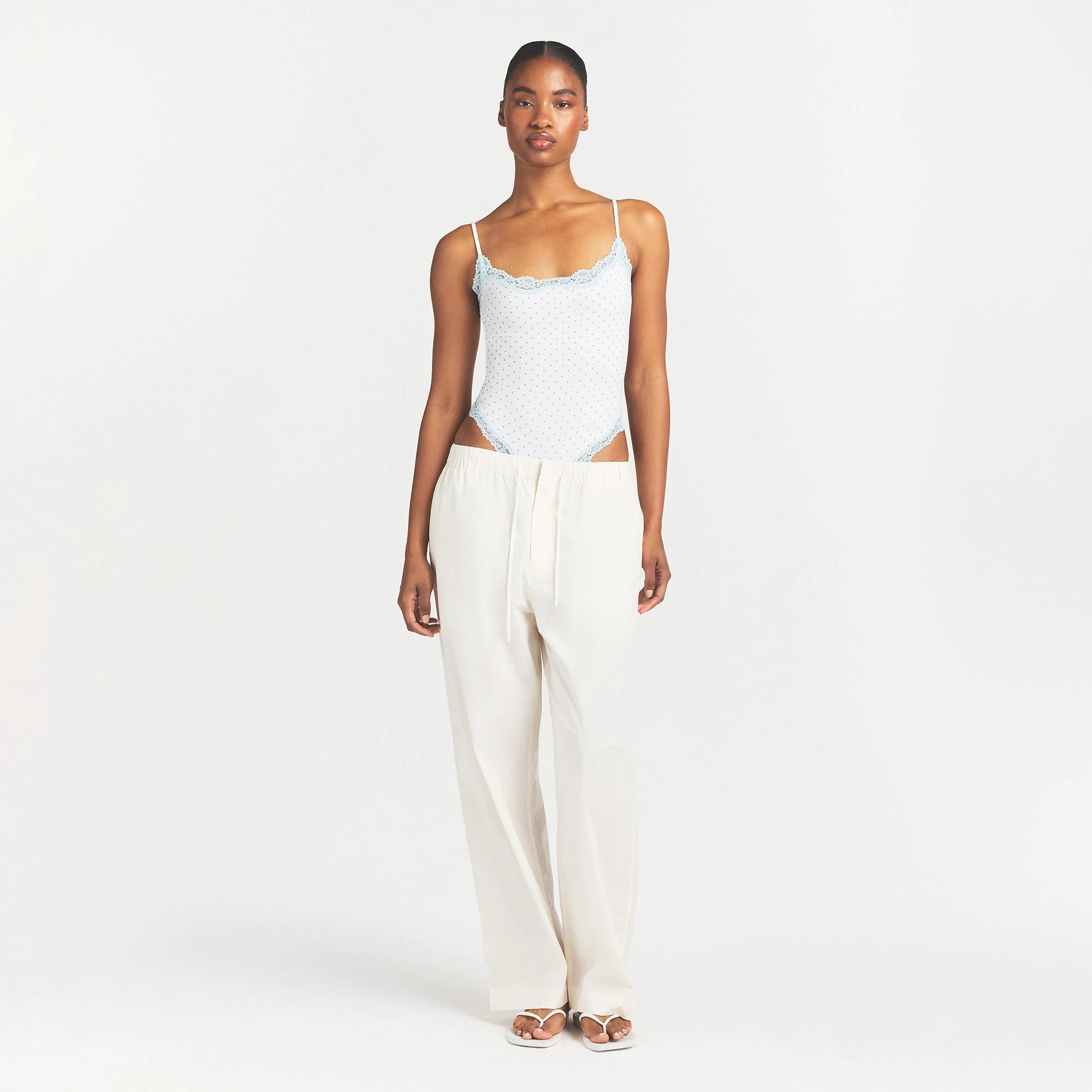 FITS EVERYBODY LACE CAMI BODYSUIT | SLATE PIN DOT PRINT ON A MODEL FRONT VIEW @ | FOCUS: 0.0, 1.0, 0.9