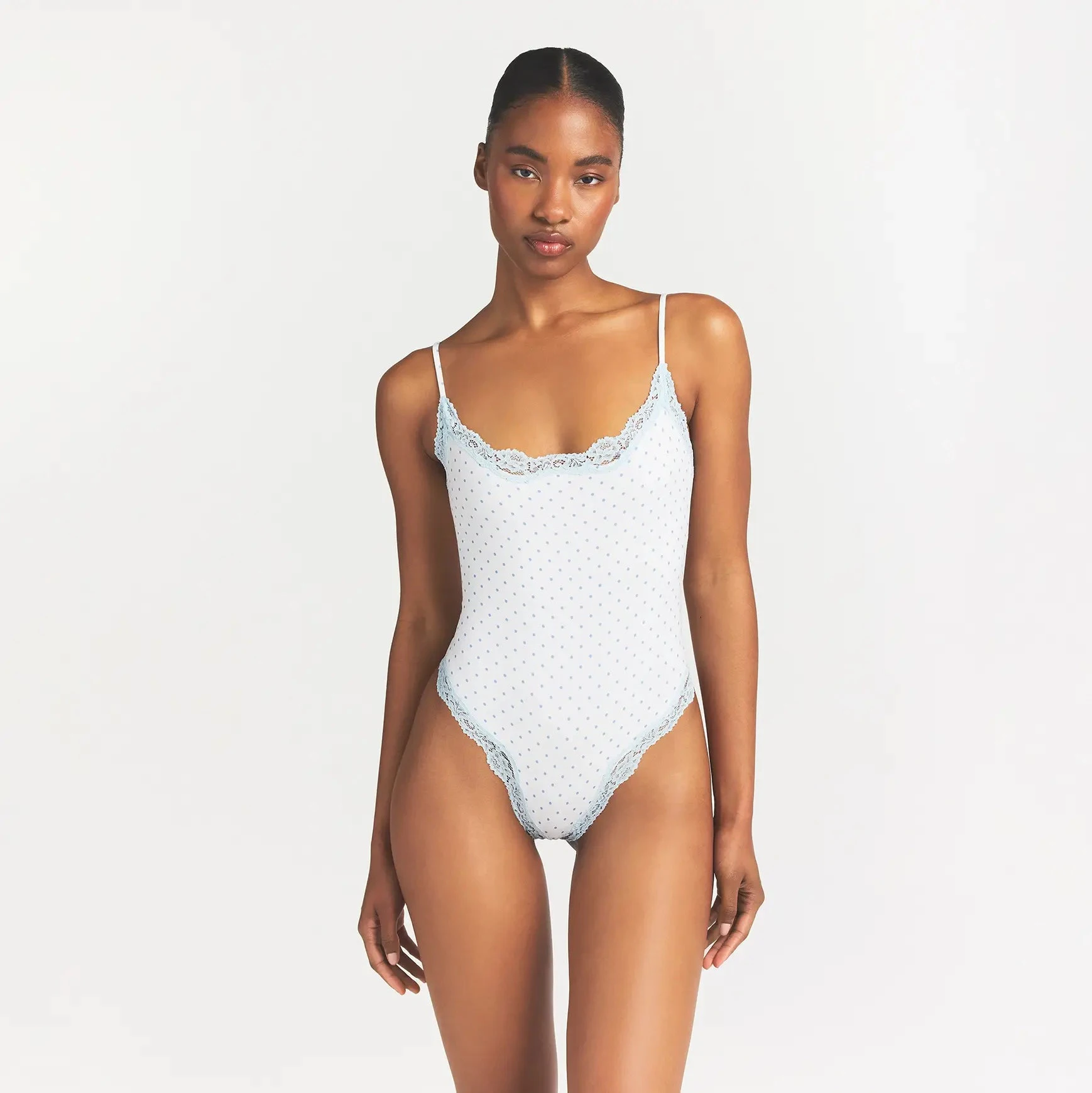 FITS EVERYBODY LACE CAMI BODYSUIT | SLATE PIN DOT PRINT ON A MODEL FRONT VIEW @ | FOCUS: 0.0, 1.0, 0.9