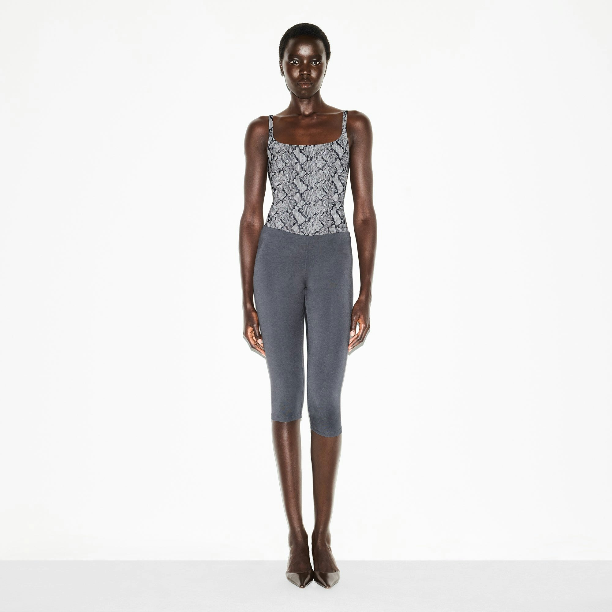 FITS EVERYBODY SQUARE NECK BODYSUIT | SHADOW SNAKE PRINT ON A MODEL FRONT VIEW @ | FOCUS: 0.0, 1.0, 0.9