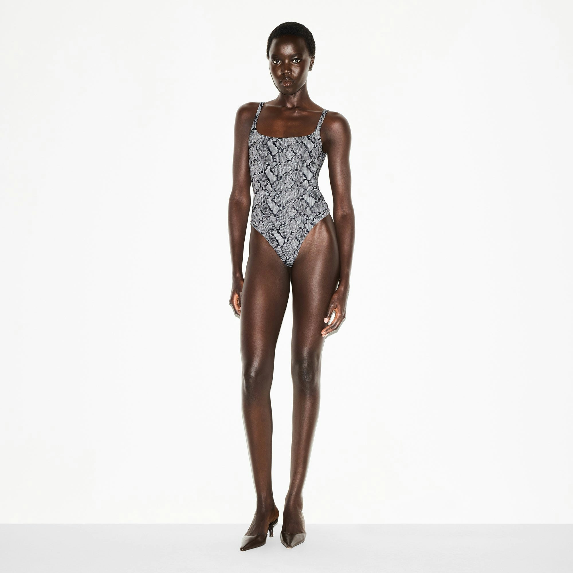 FITS EVERYBODY SQUARE NECK BODYSUIT | SHADOW SNAKE PRINT ON A MODEL FRONT VIEW @ | FOCUS: 0.0, 1.0, 0.9