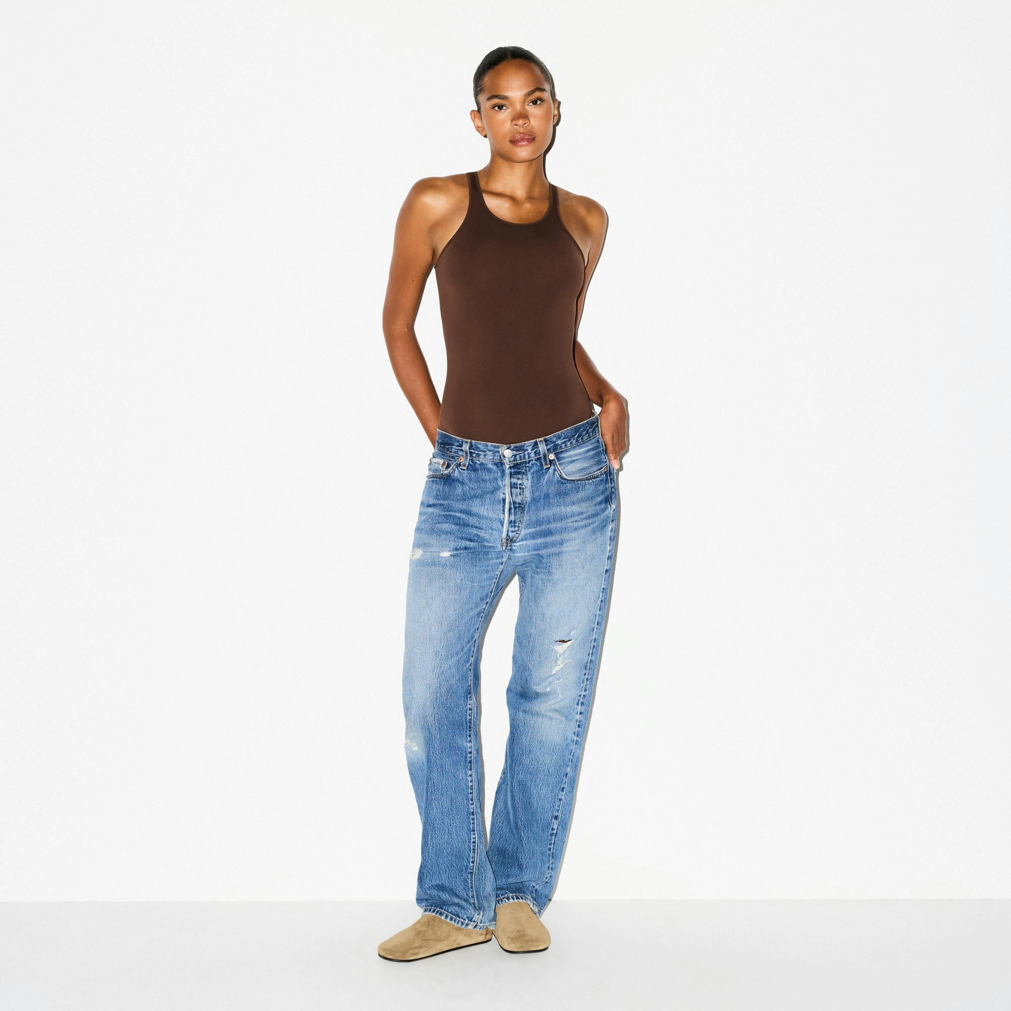SOFT SMOOTHING SEAMLESS PADDED BODYSUIT | COCOA ON A MODEL FRONT VIEW @ | FOCUS: 0.0, 1.0, 0.9