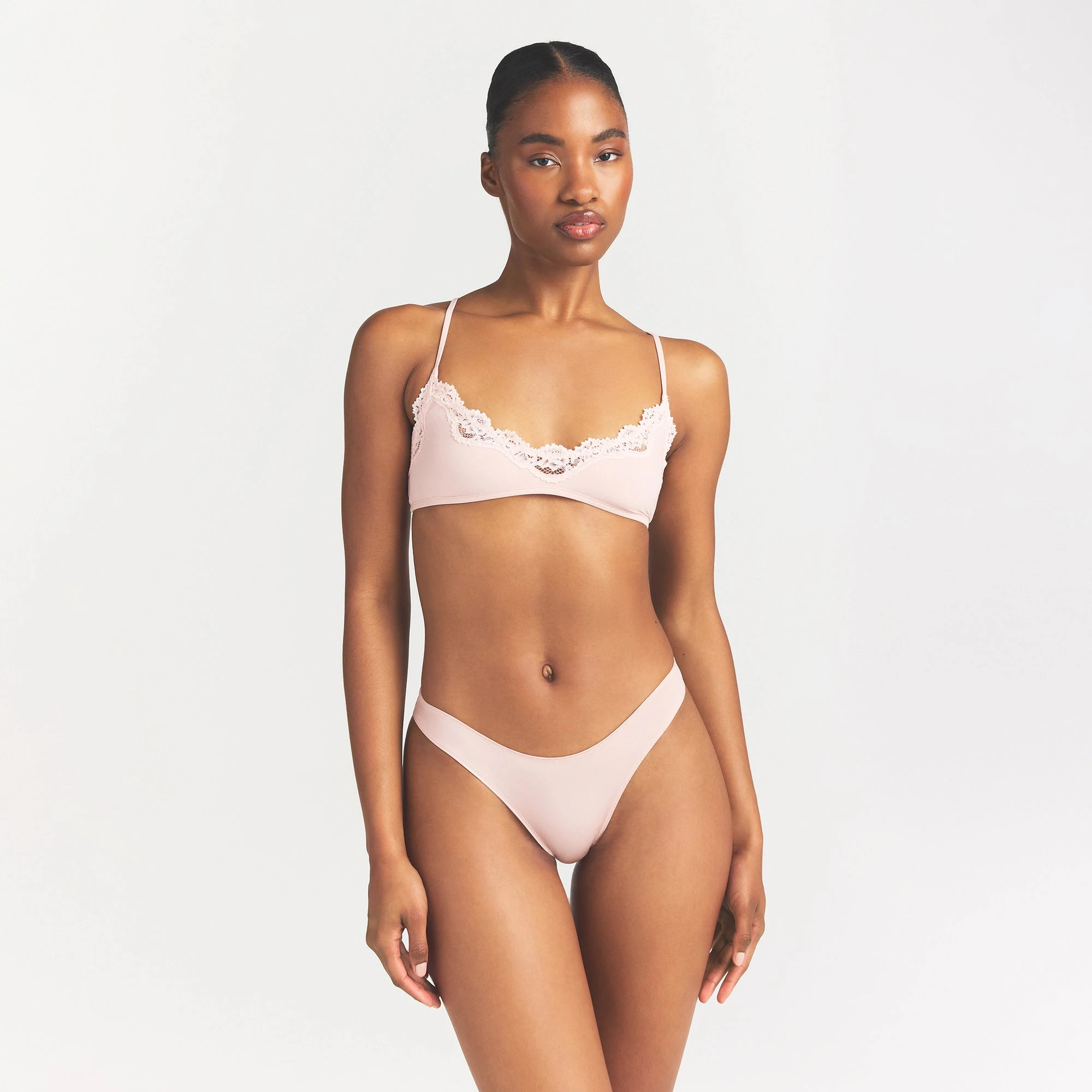 SHINE FOUNDATIONS DIPPED BIKINI | DUSTY PINK ON A MODEL FRONT VIEW @ | FOCUS: 0.0, 1.0, 0.9