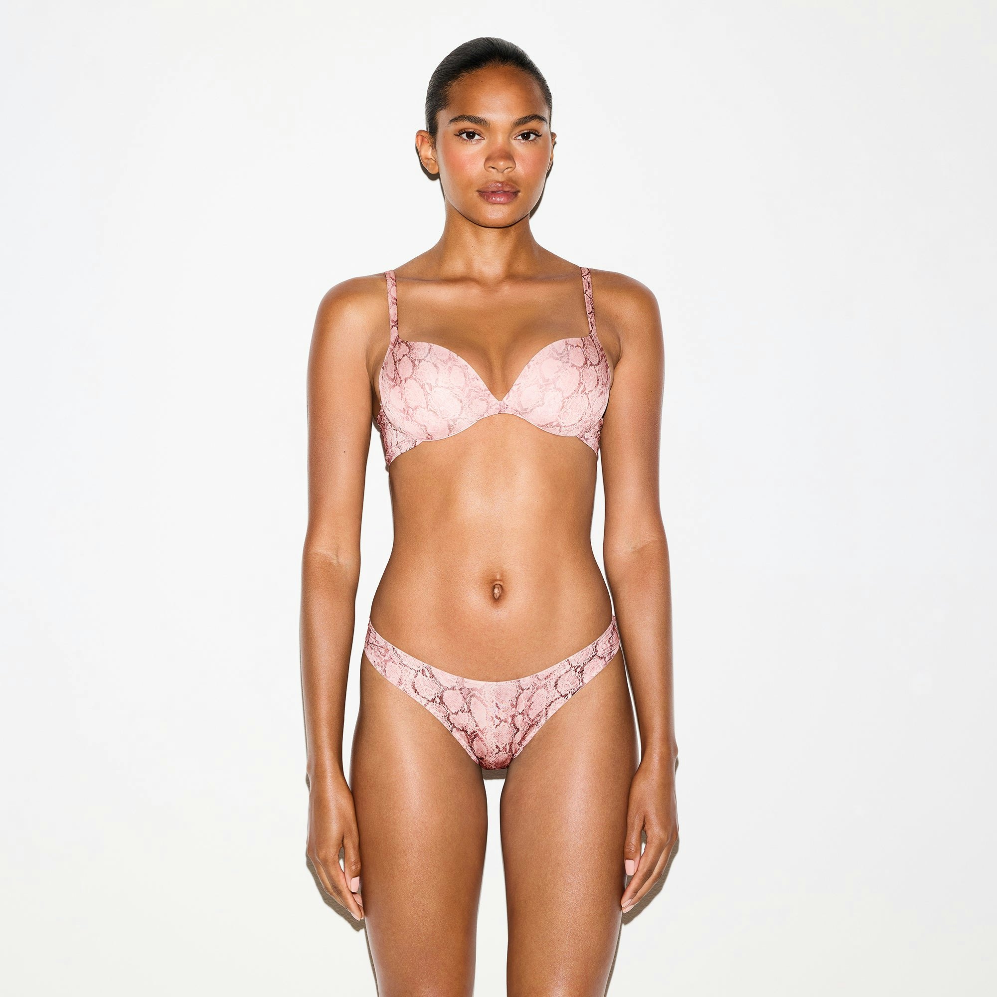SHINE FOUNDATIONS DIPPED BIKINI | ROSE PASTEL SNAKE PRINT ON A MODEL FRONT VIEW @ | FOCUS: 0.0, 1.0, 0.9