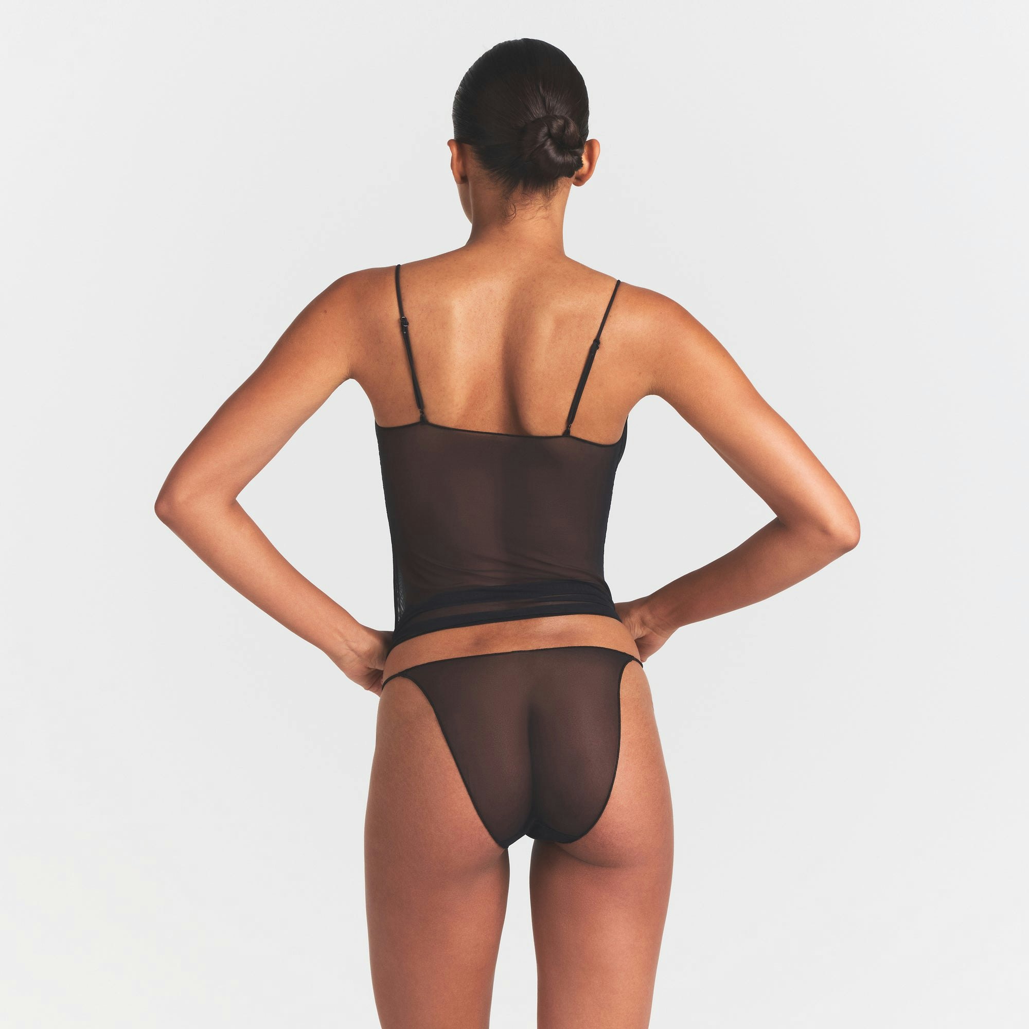 ULTRA FINE MESH STRING BIKINI | OBSIDIAN ON A MODEL SIDE VIEW @ | FOCUS: 0.0, 1.0, 0.9