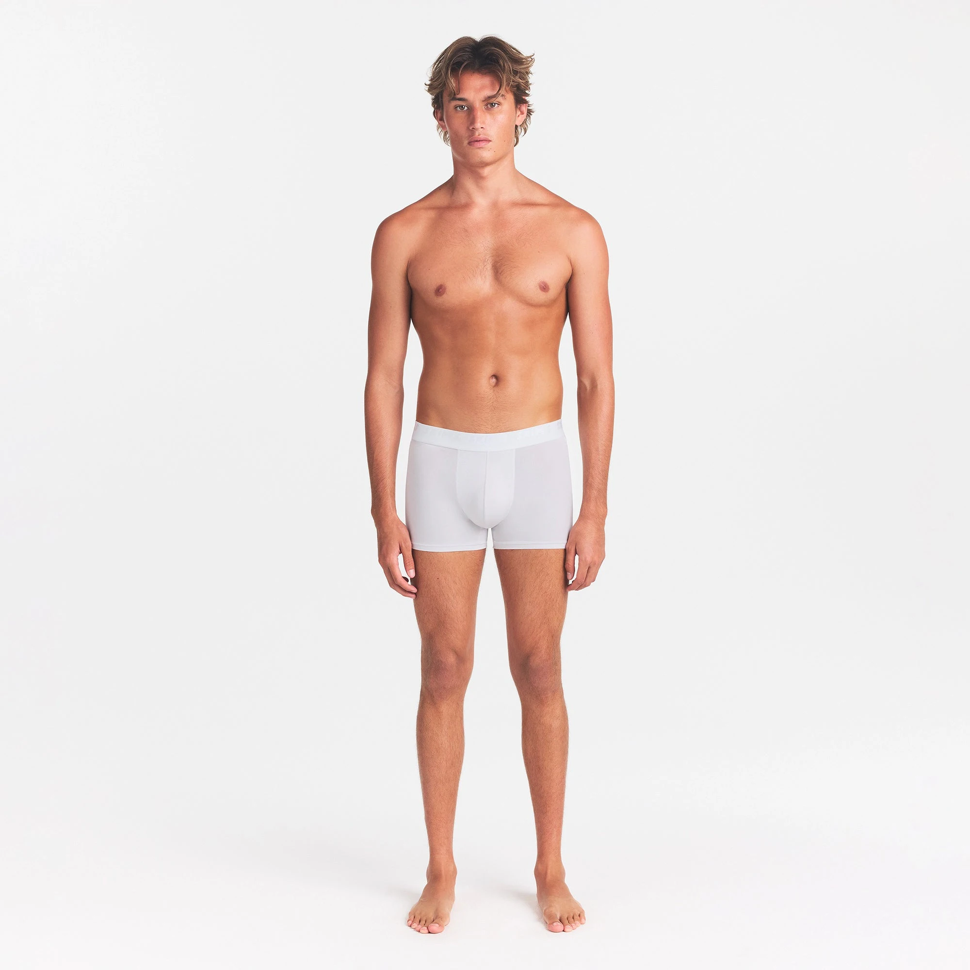 SKIMS STRETCH MENS 5" BOXER BRIEF | CHALK ON A MODEL FRONT VIEW @ | FOCUS: 0.0, 1.0, 0.9
