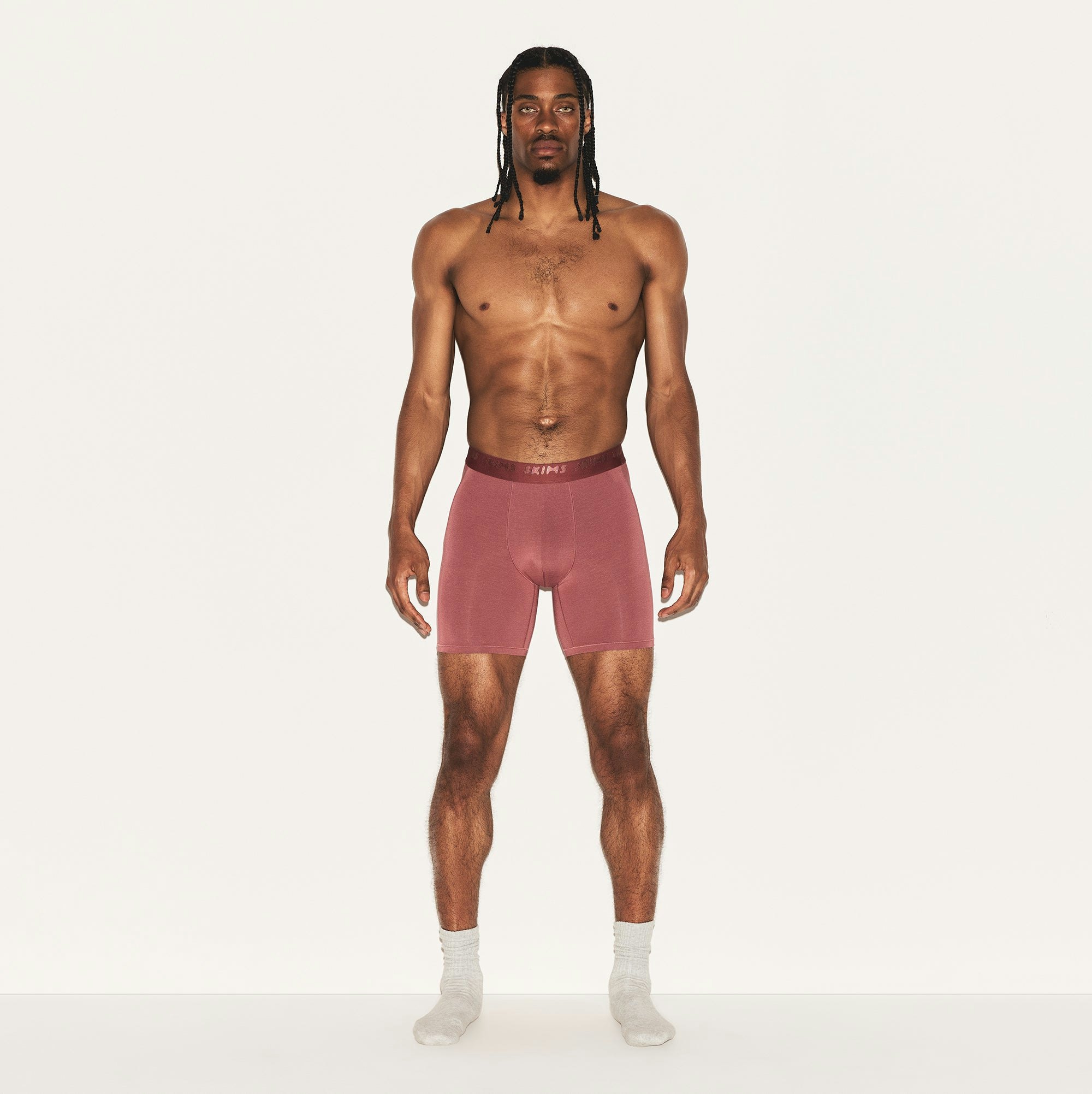 SKIMS STRETCH MENS 5 INCH BOXER BRIEF | CORDOVAN ON A MODEL FRONT VIEW | FOCUS: 0.0, 1.0, 0.9