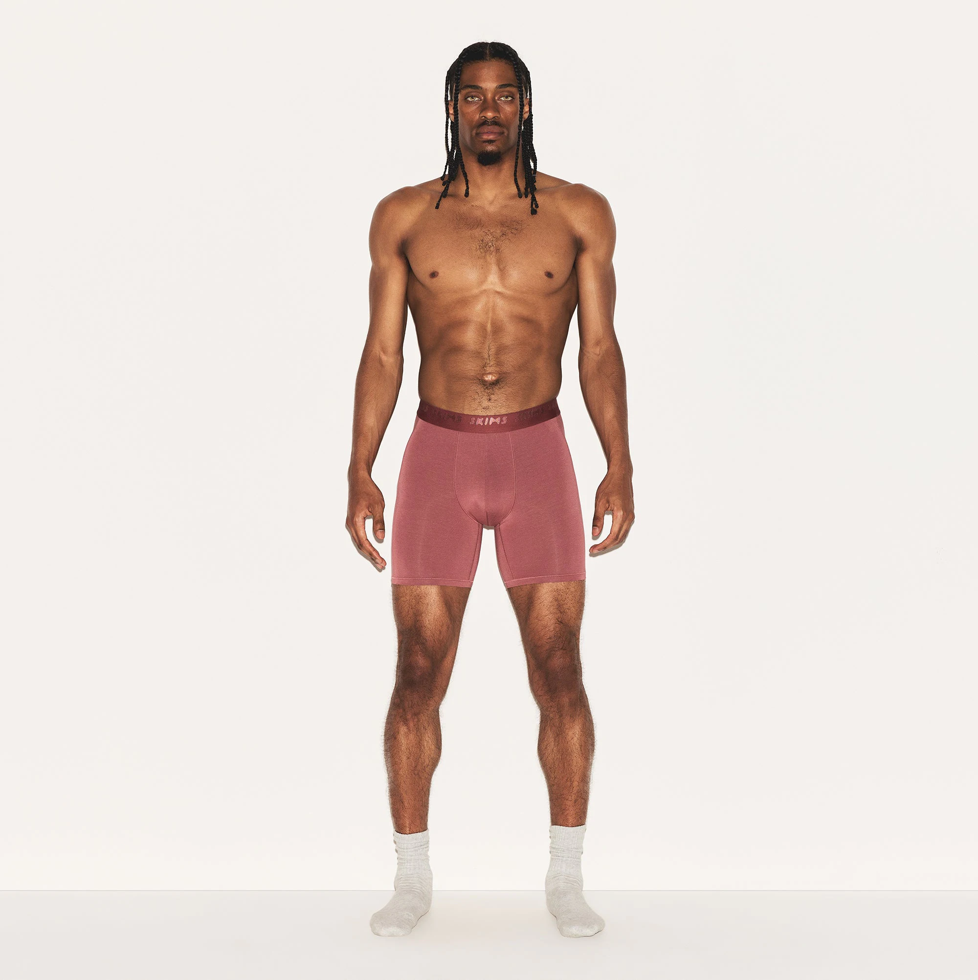 SKIMS STRETCH MENS 5 INCH BOXER BRIEF | CORDOVAN ON A MODEL FRONT VIEW | FOCUS: 0.0, 1.0, 0.9