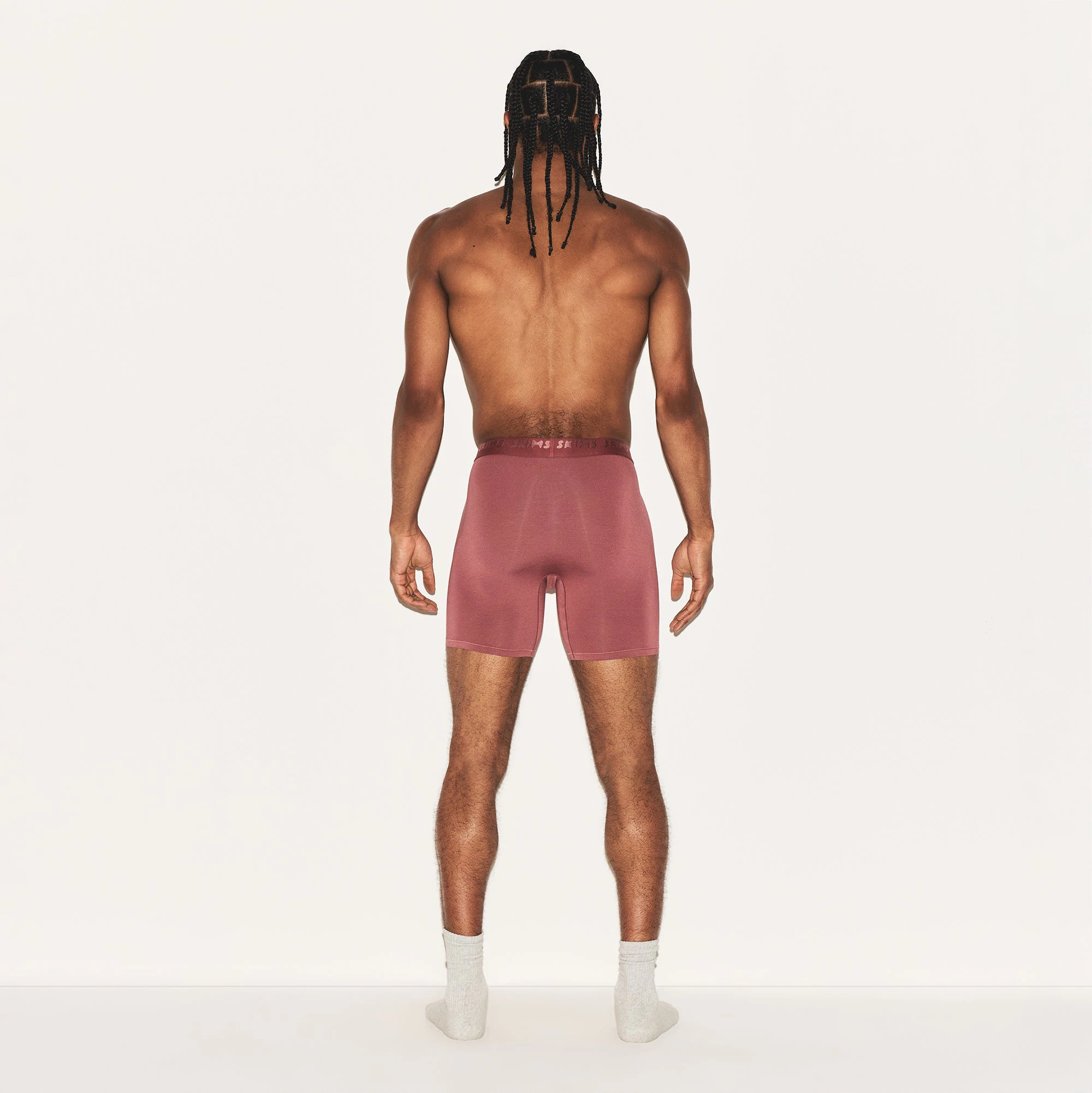 SKIMS STRETCH MENS 5 INCH BOXER BRIEF | CORDOVAN ON A MODEL BACK VIEW | FOCUS: 0.0, 1.0, 0.9