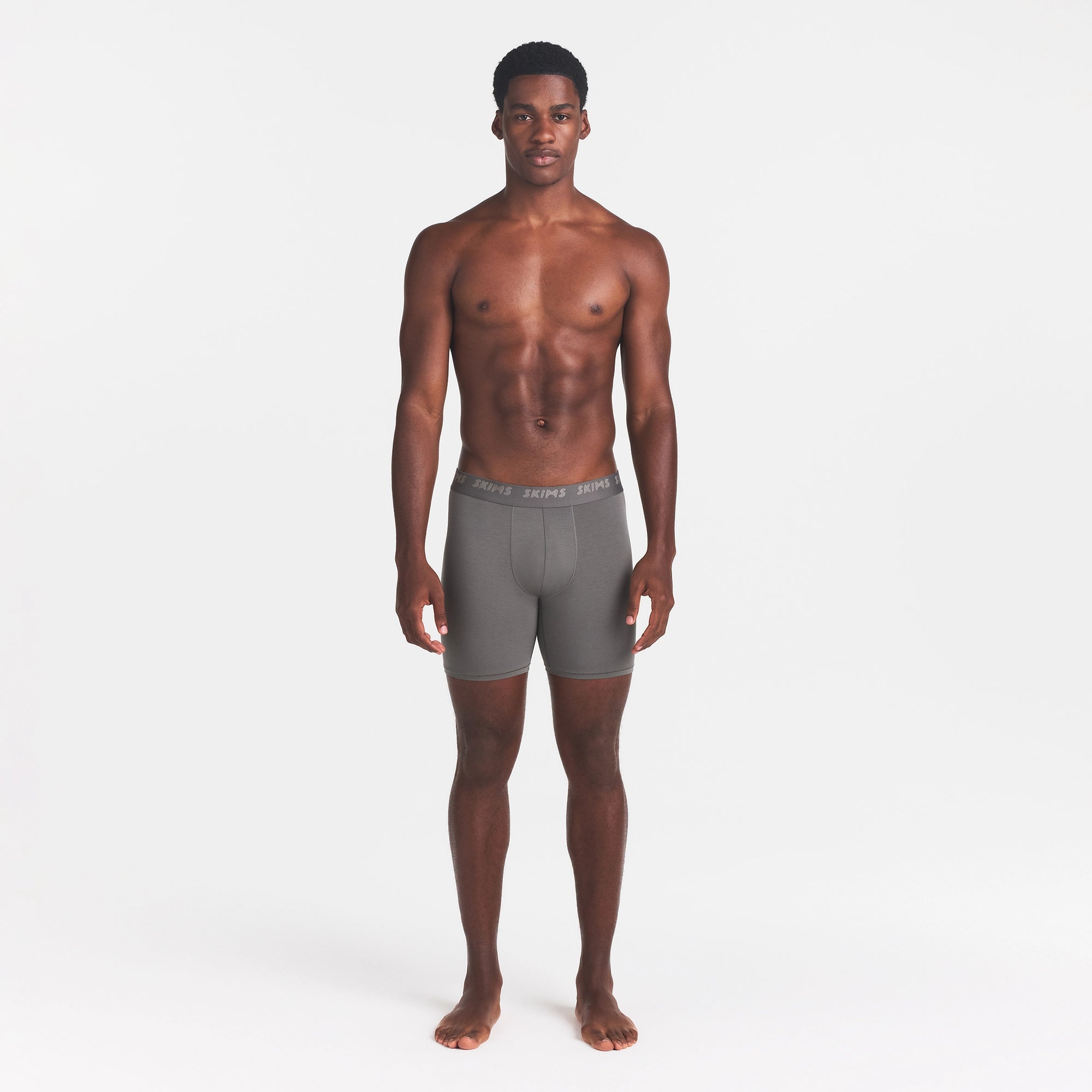 SKIMS STRETCH MENS 5" BOXER BRIEF | GUNMETAL ON A MODEL FRONT VIEW