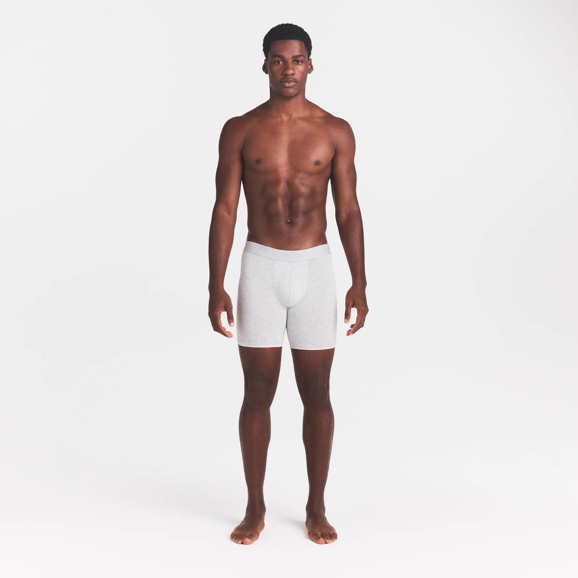 SKIMS STRETCH MENS 5" BOXER BRIEF | LIGHT HEATHER GREY ON A MODEL FRONT VIEW @ | FOCUS: 0.0, 1.0, 0.9
