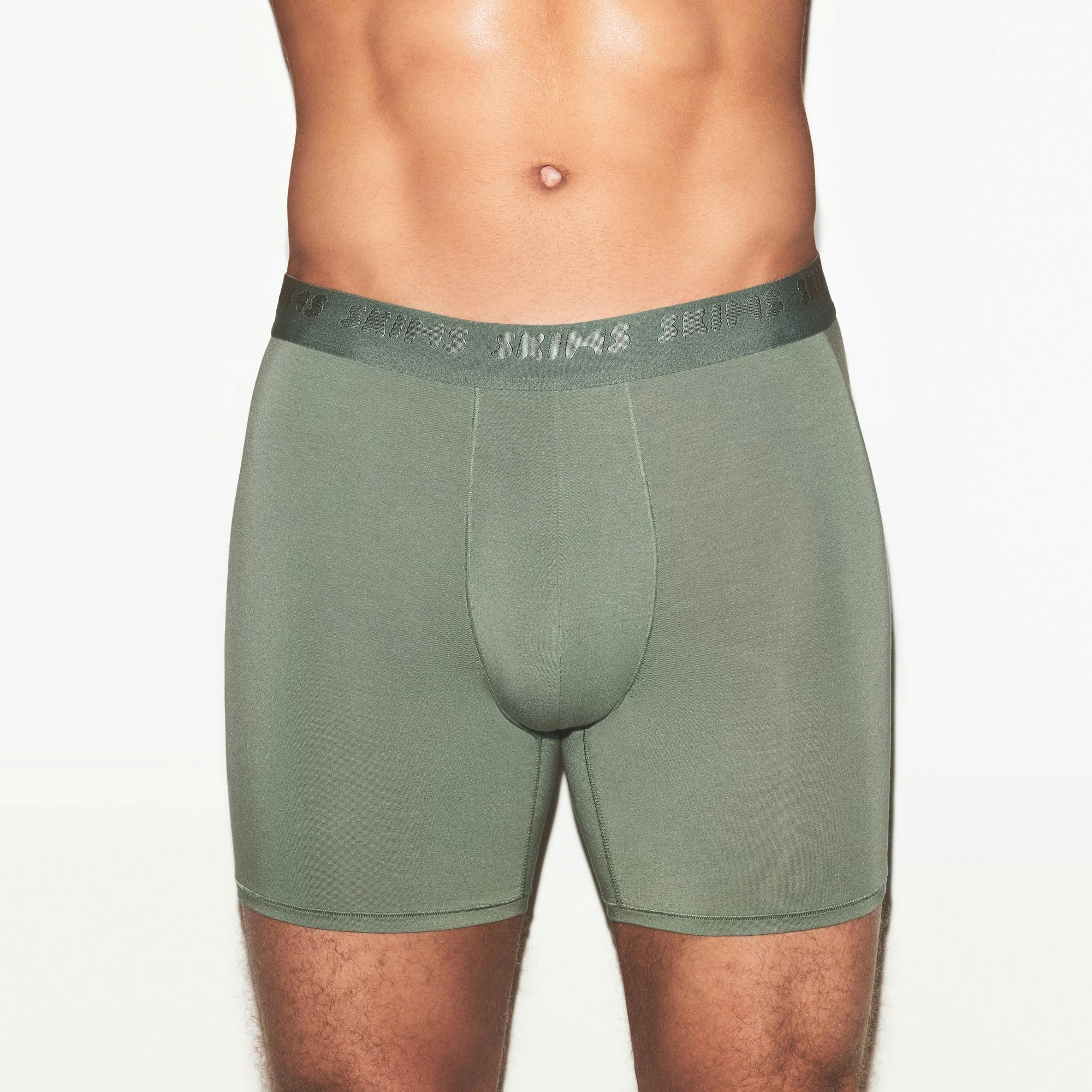 SKIMS STRETCH MENS 5 INCH BOXER BRIEF | LAUREL ON A MODEL SIDE VIEW | FOCUS: 0.0, 1.0, 0.9
