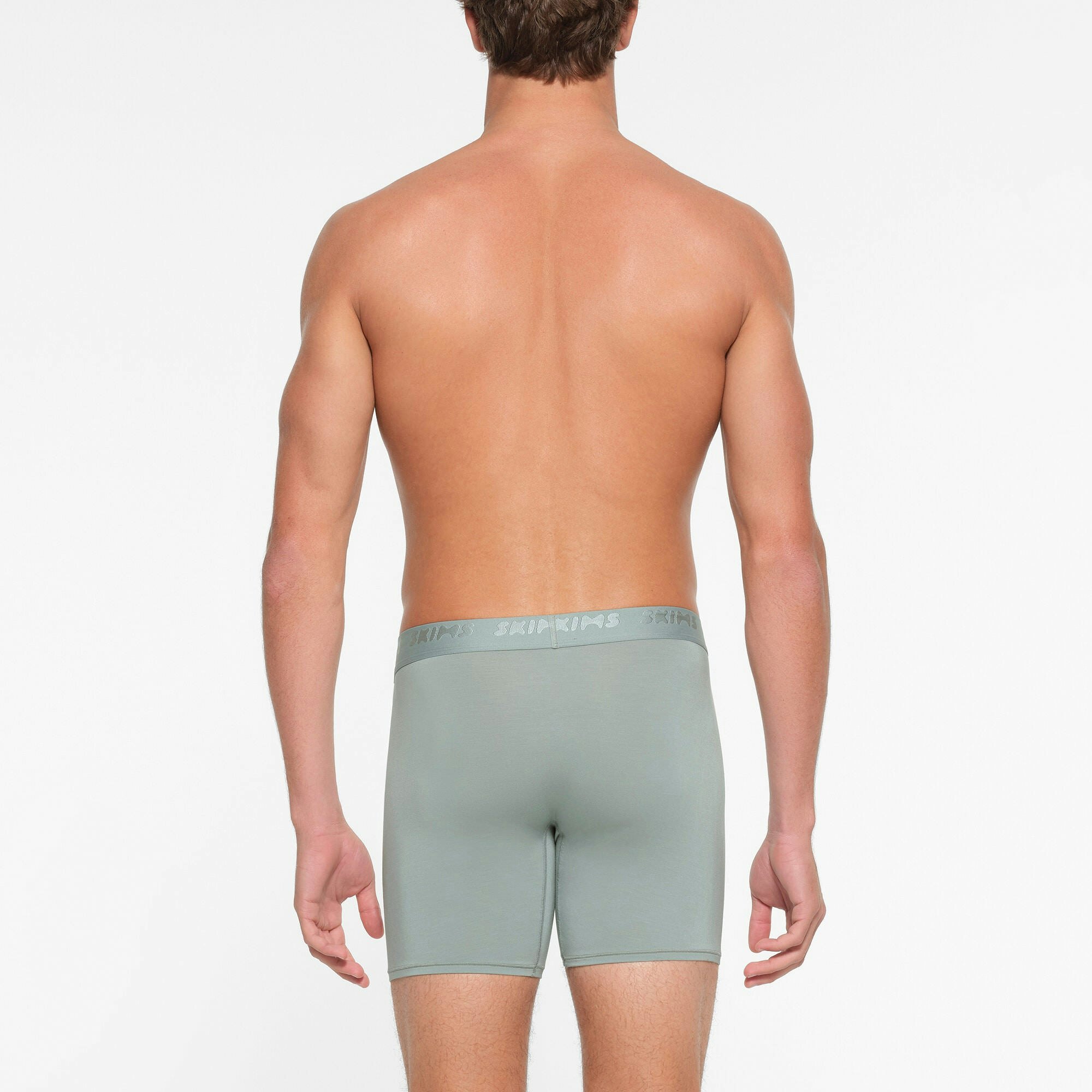 SKIMS STRETCH MENS 5" BOXER BRIEF | VAPOR ON A MODEL BACK VIEW