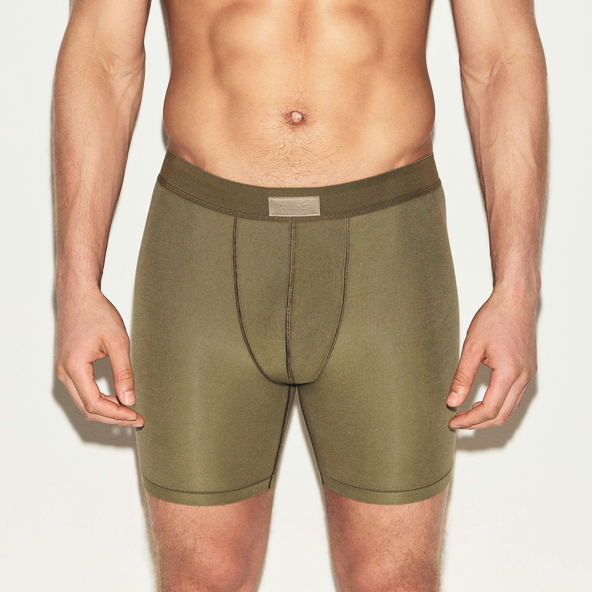 SKIMS COTTON MENS 5 INCH BOXER BRIEF | ARMY ON A MODEL FRONT VIEW | FOCUS: 0.0, 1.0, 0.9