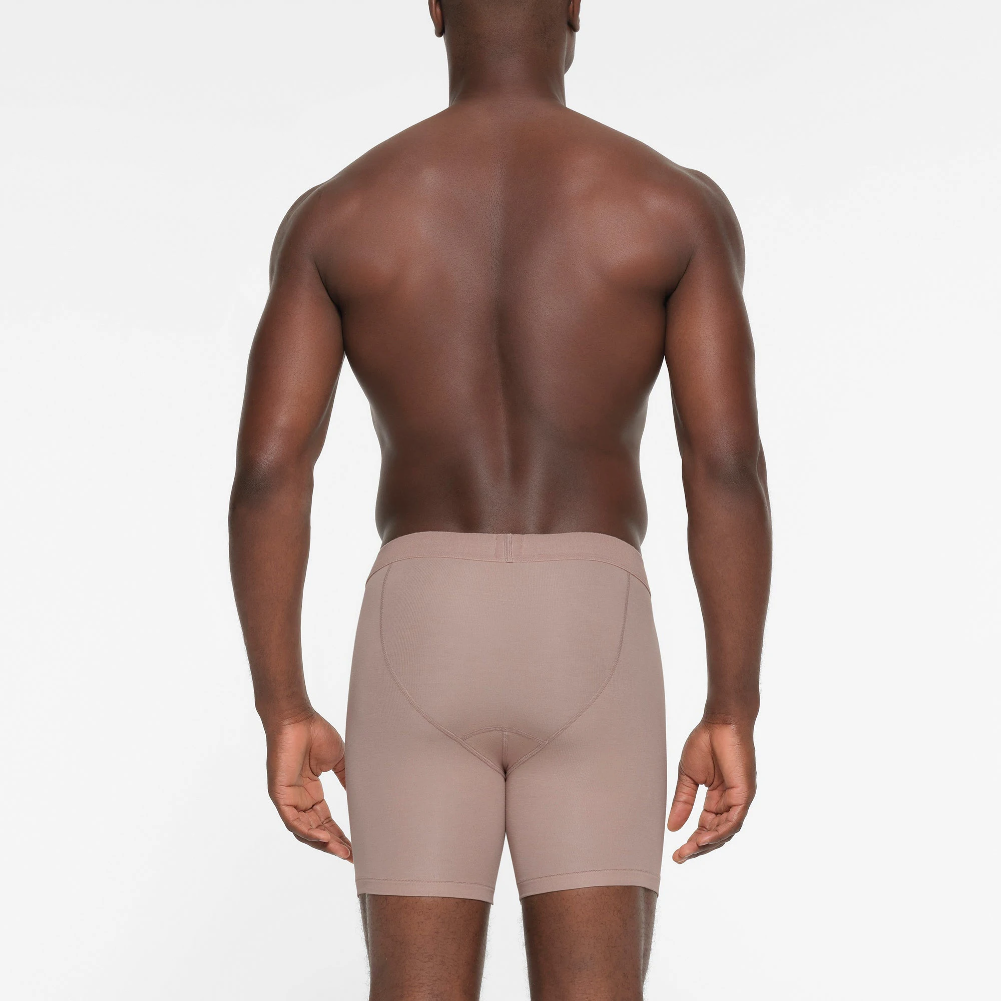 SKIMS COTTON MENS 5" BOXER BRIEF | FAWN ON A MODEL BACK VIEW