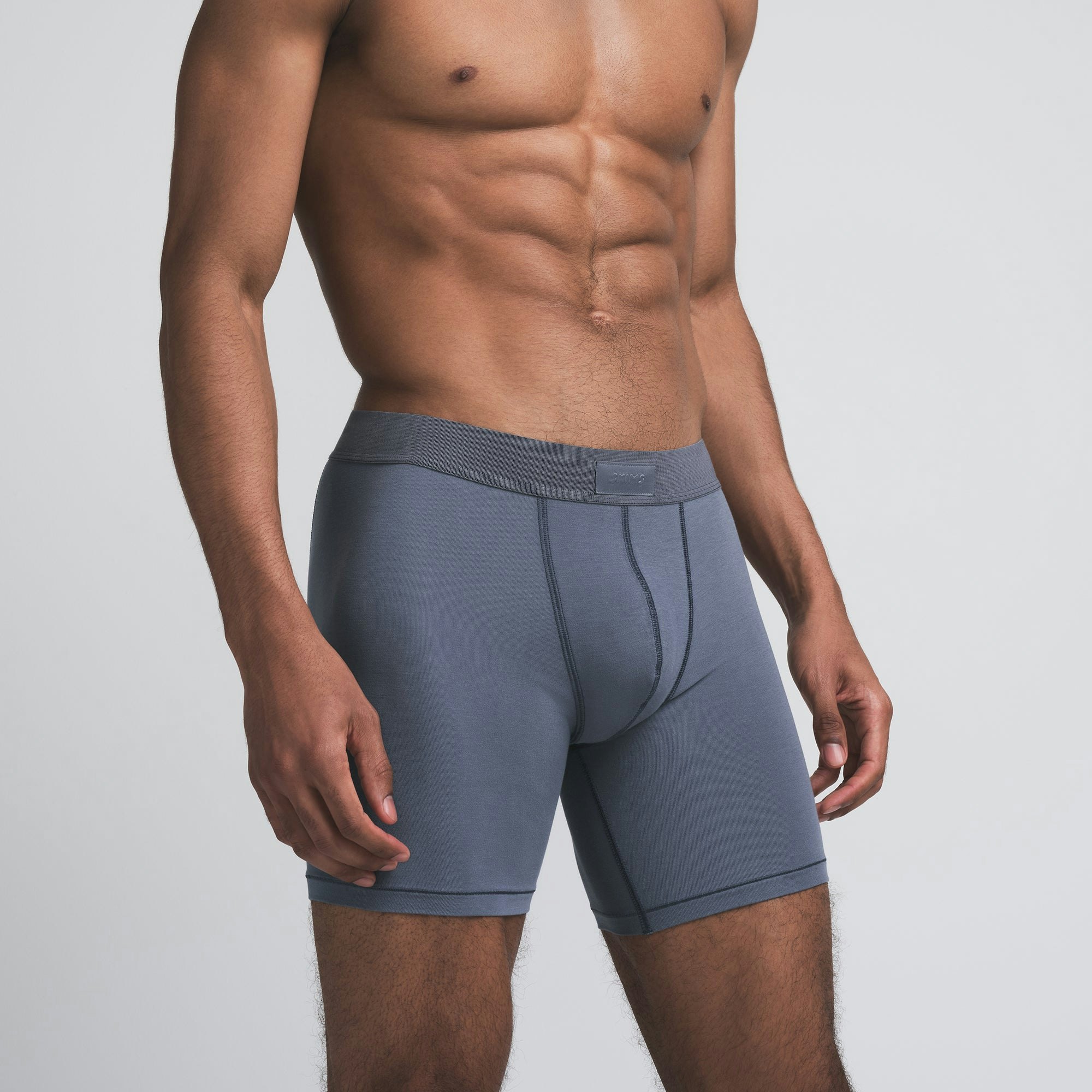 SKIMS COTTON MENS 5 INCH BOXER BRIEF | STEEL BLUE ON A MODEL FRONT VIEW | FOCUS: 0.0, 1.0, 0.9