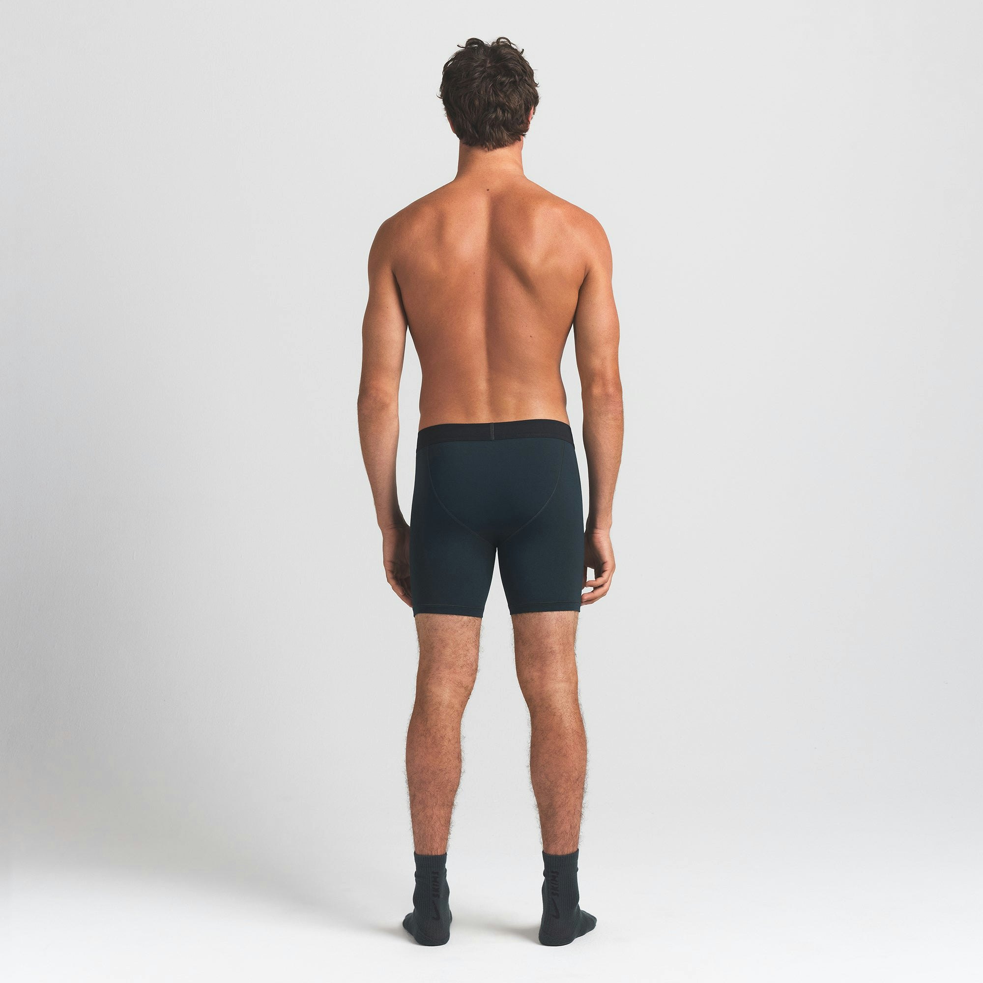 SKIMS COTTON MENS 5" BOXER BRIEF | VERDANT ON A MODEL BACK VIEW @ | FOCUS: 0.0, 1.0, 0.9