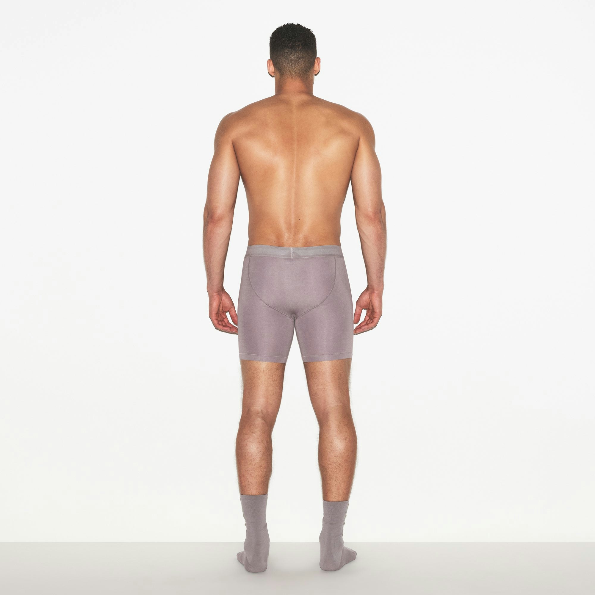 SKIMS COTTON MENS 5 INCH BOXER BRIEF | ZINC ON A MODEL FRONT VIEW | FOCUS: 0.0, 1.0, 0.9