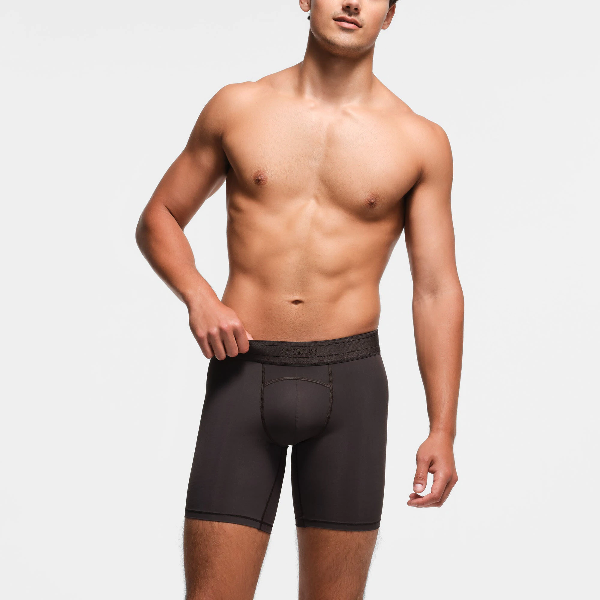 SKIMS SPORT MENS 7" BOXER BRIEF | PHOENIX ON A MODEL FRONT VIEW