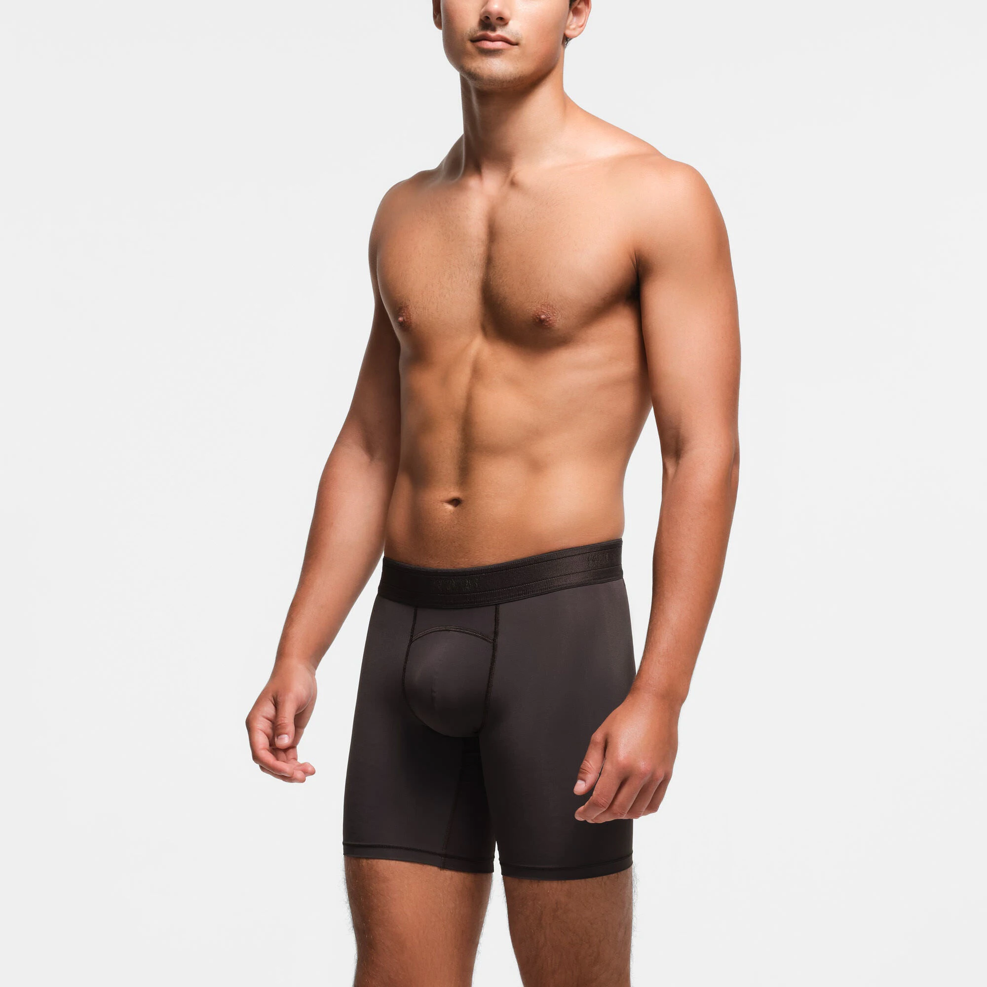 SKIMS SPORT MENS 7" BOXER BRIEF | PHOENIX ON A MODEL SIDE VIEW