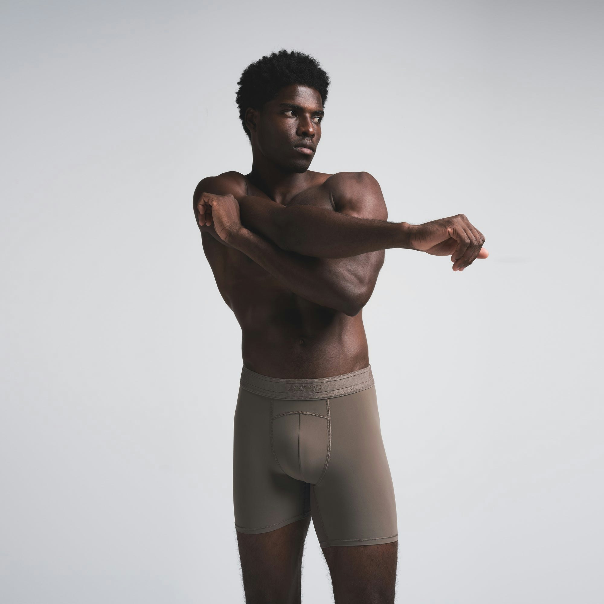 SKIMS SPORT MENS 5" BOXER BRIEF | AMETHYST (MENS BOXERS) ON A MODEL FRONT VIEW