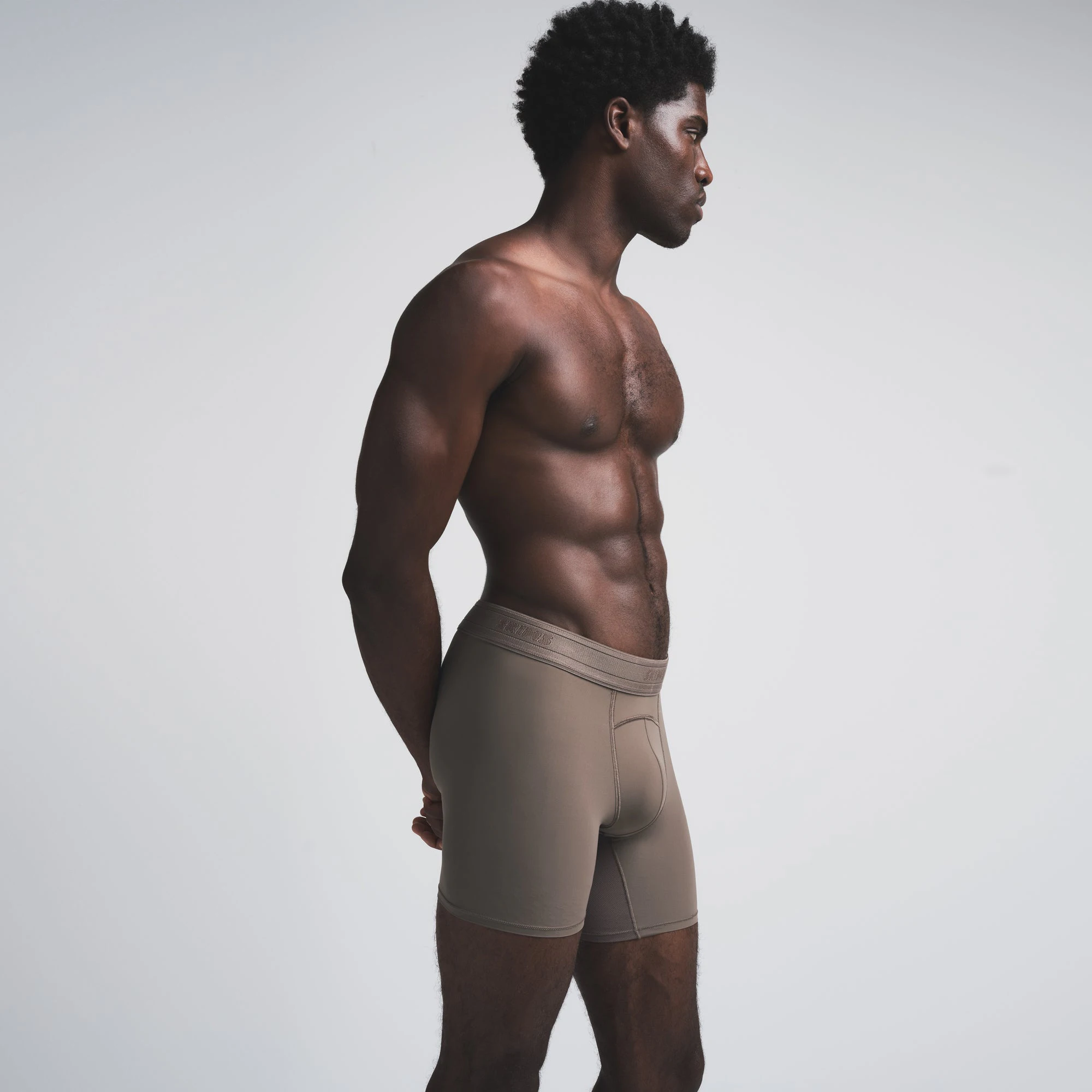 SKIMS SPORT MENS 5" BOXER BRIEF | AMETHYST (MENS BOXERS) ON A MODEL FRONT VIEW