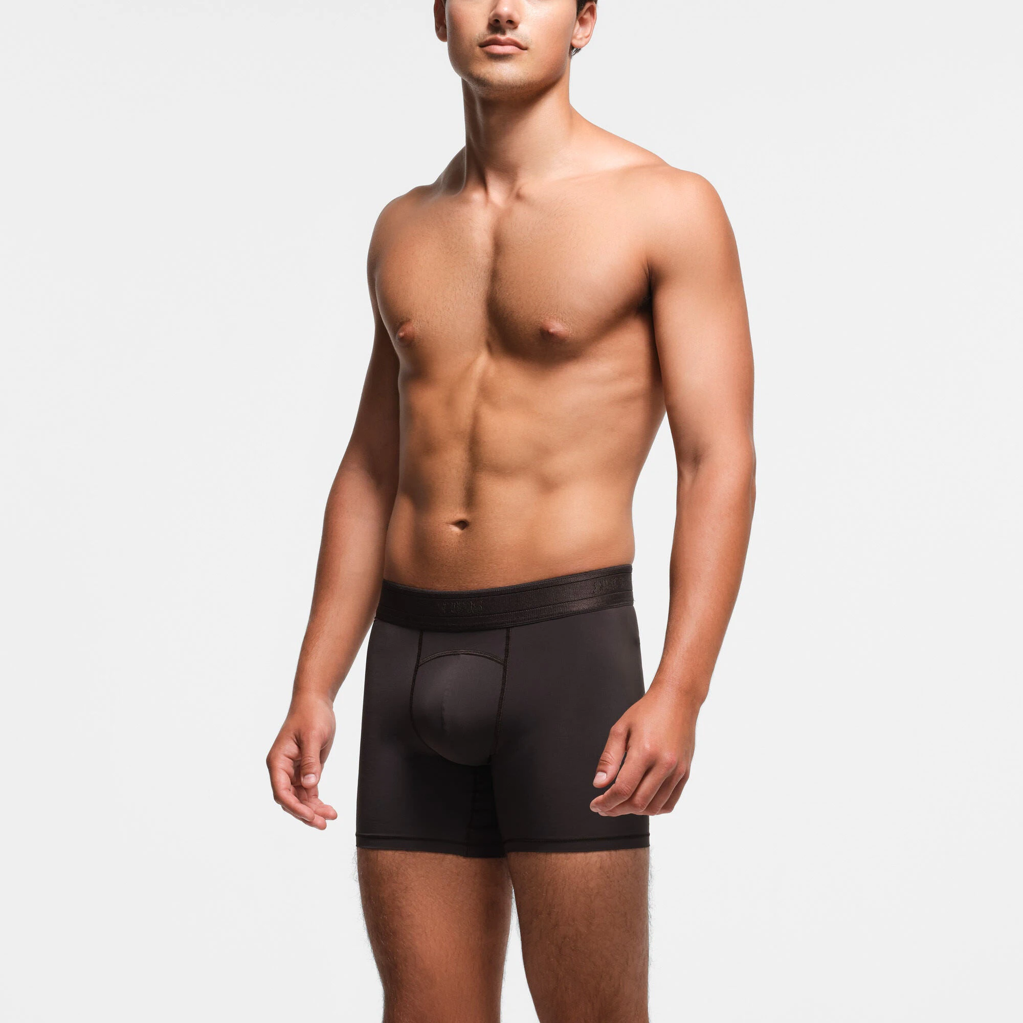 SKIMS SPORT MENS 5" BOXER BRIEF | PHOENIX ON A MODEL SIDE VIEW