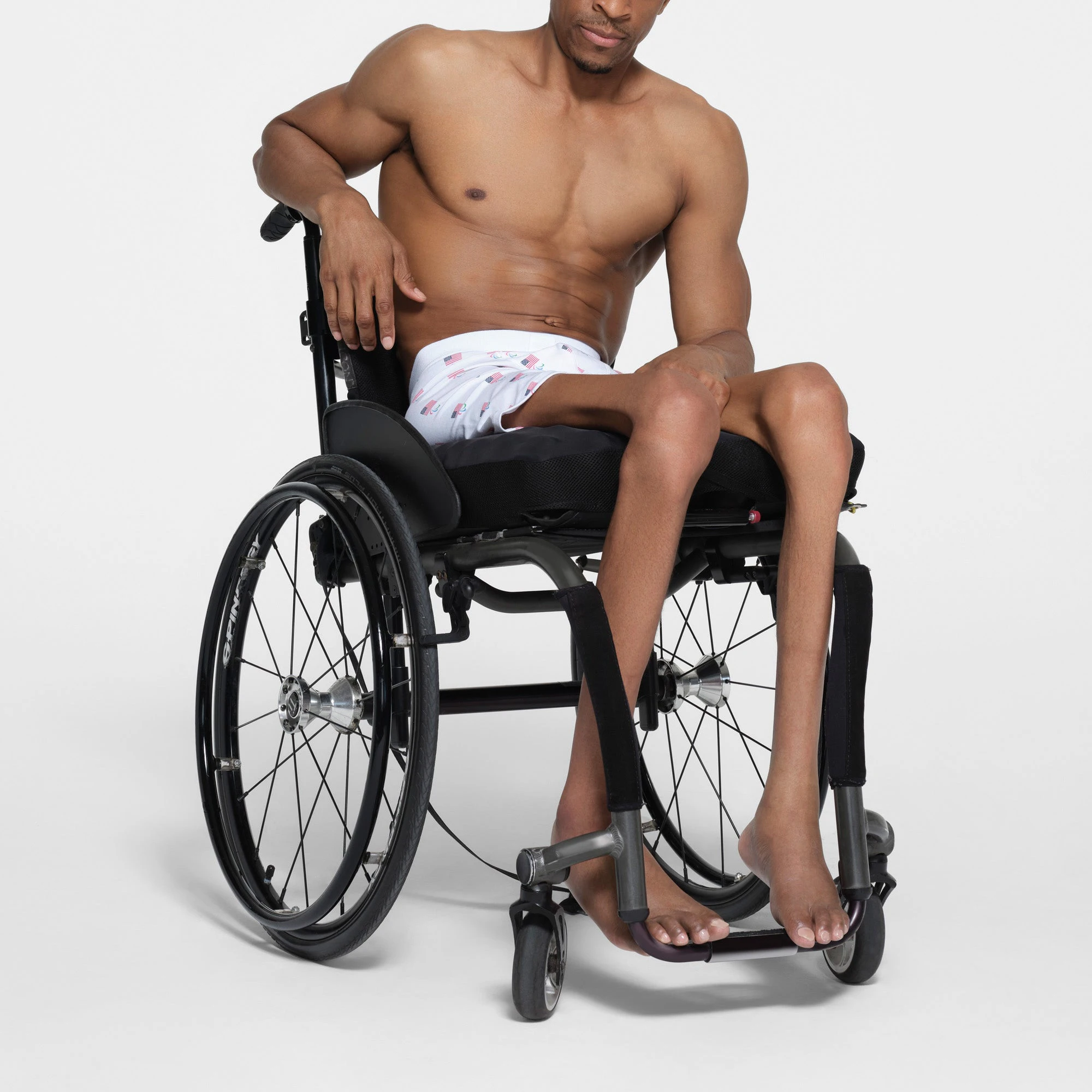 SKIMS FOR TEAM USA SKIMS COTTON MENS PARALYMPIC 5 INCH BOXER BRIEF | WHITE ON A MODEL SIDE VIEW