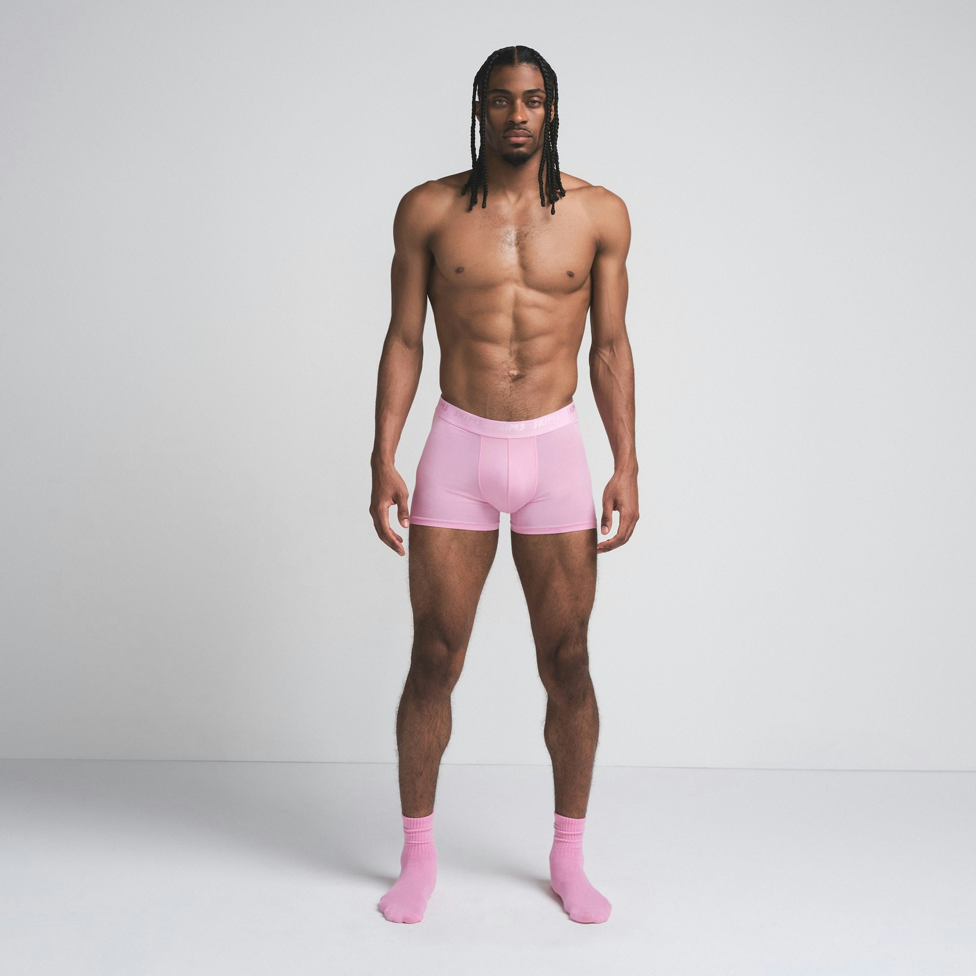 SKIMS STRETCH MENS 3" BOXER BRIEF 3-PACK | BUBBLEGUM MIRROR MULTI ON A MODEL FRONT VIEW | FOCUS: 0.0, 1.0, 0.9