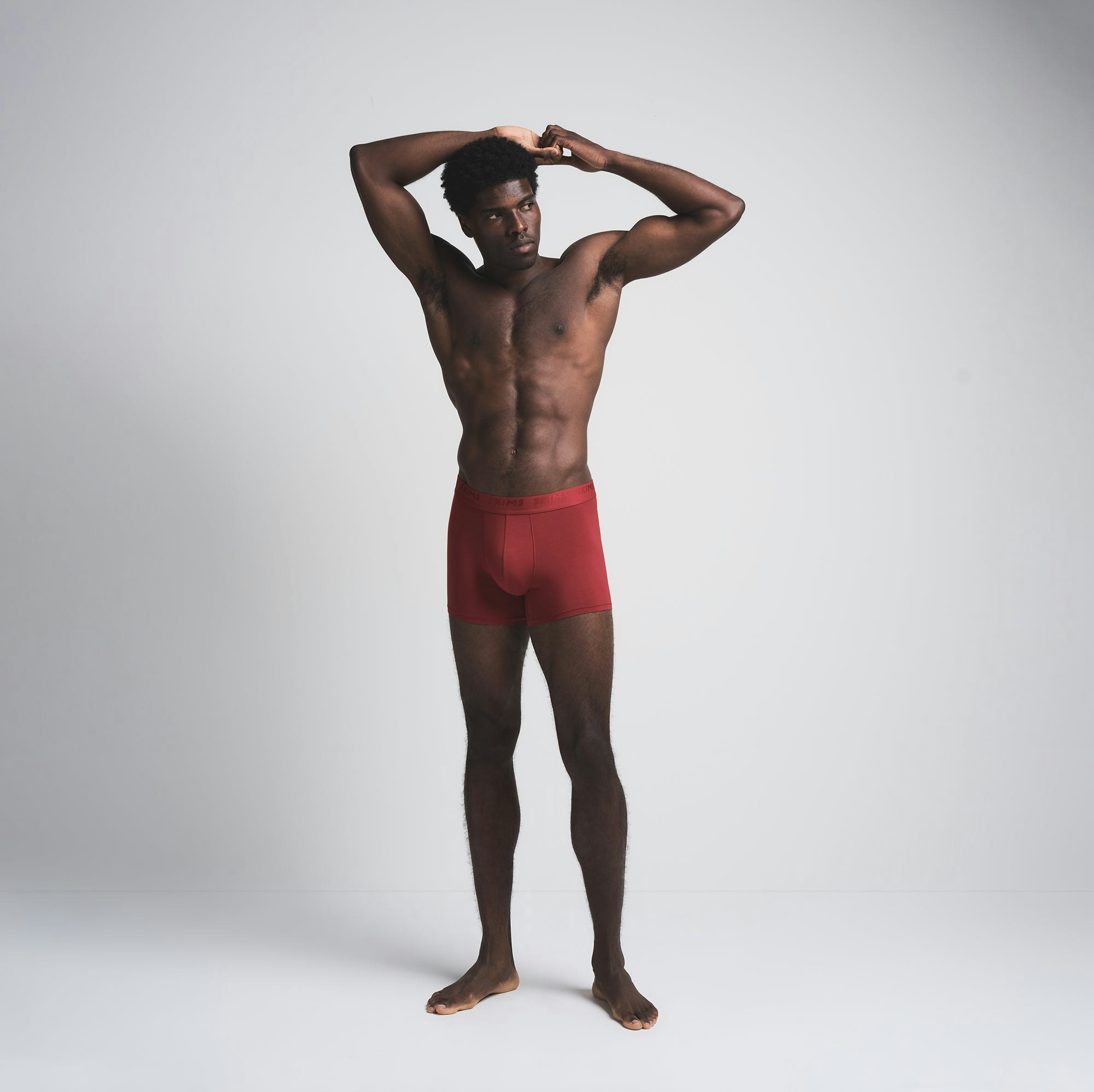 SKIMS STRETCH MENS 3 INCH BOXER BRIEF 3-PACK | BRICK MULTI ON A MODEL FRONT VIEW