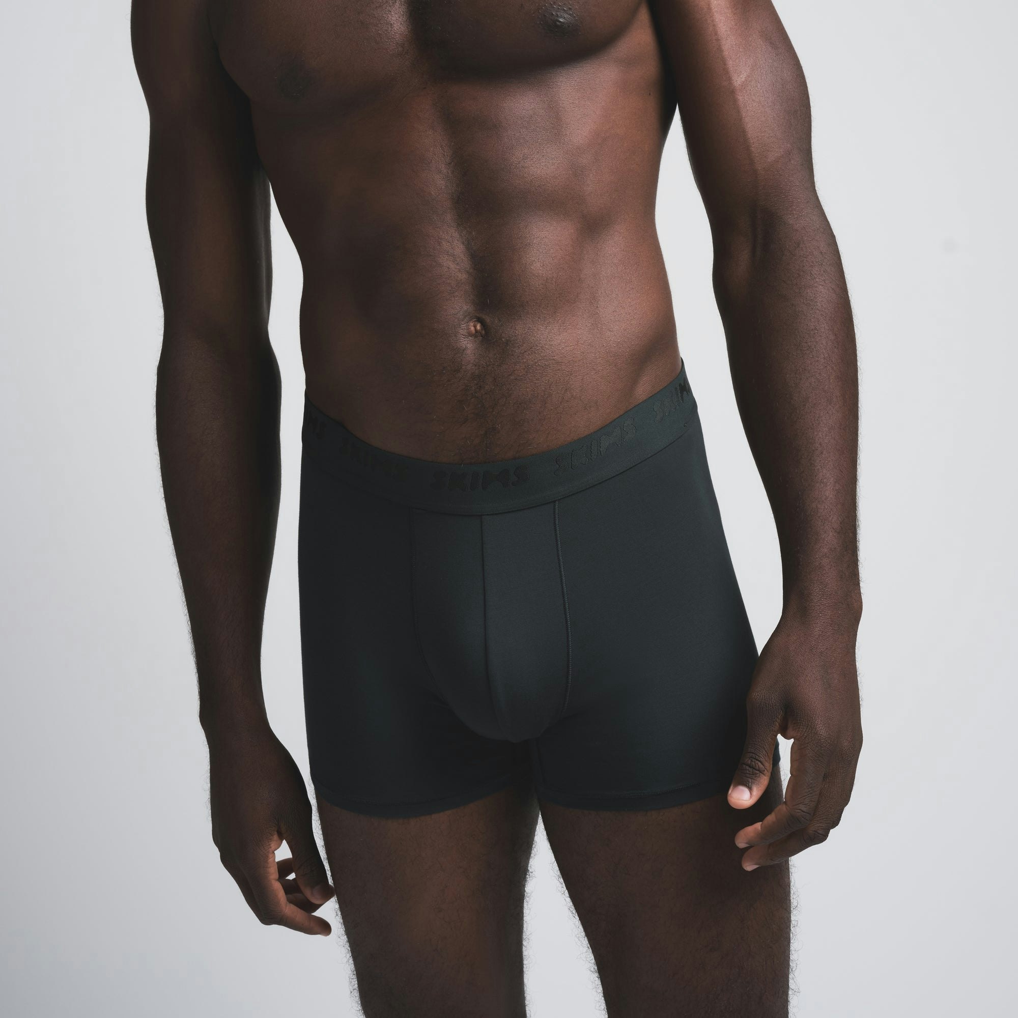 SKIMS STRETCH MENS 3" BOXER BRIEF 3-PACK | CYPRESS MULTI (MENS BOXERS) ON A MODEL FRONT VIEW