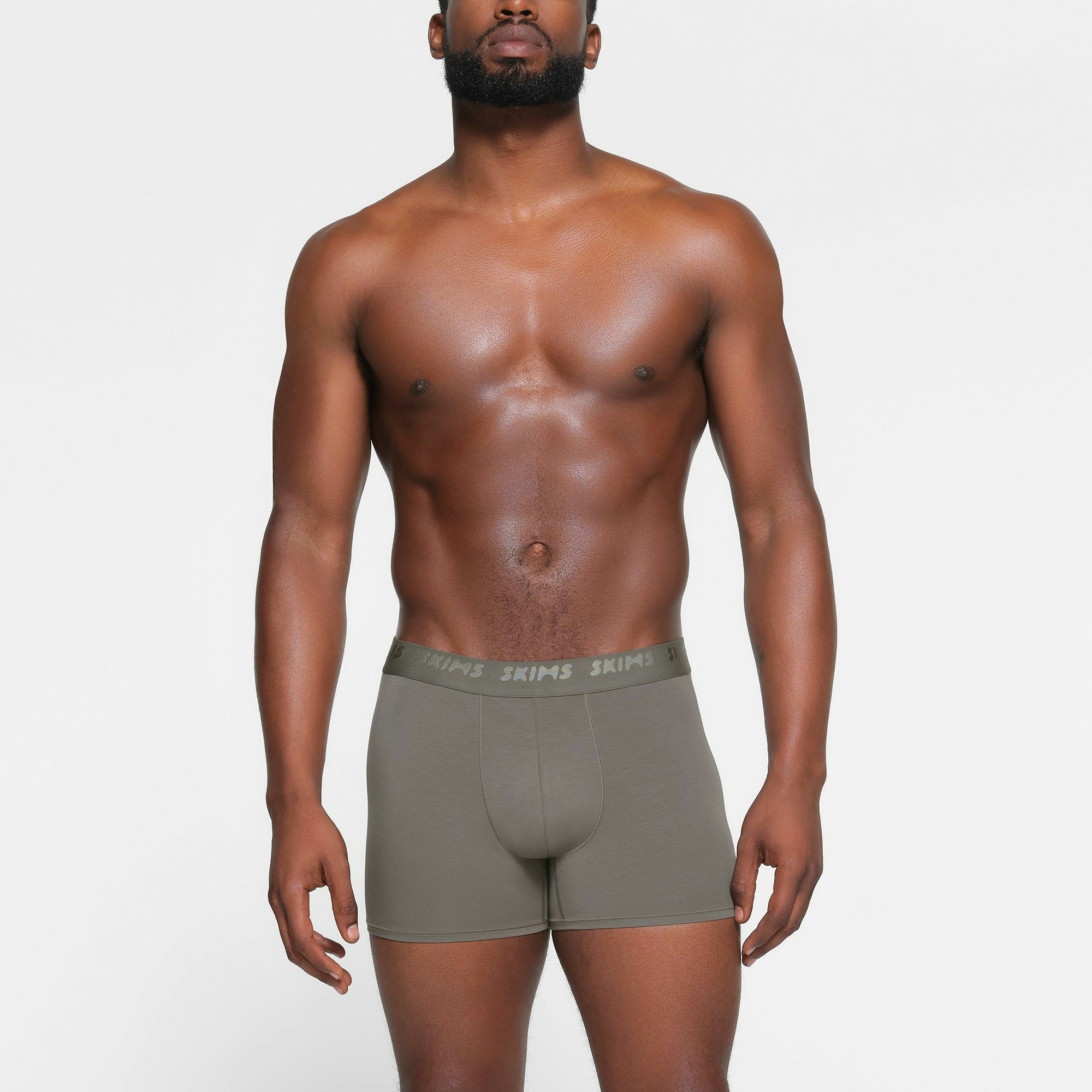SKIMS STRETCH MENS 3" BOXER BRIEF 3-PACK | DESERT MULTI ON A MODEL FRONT VIEW