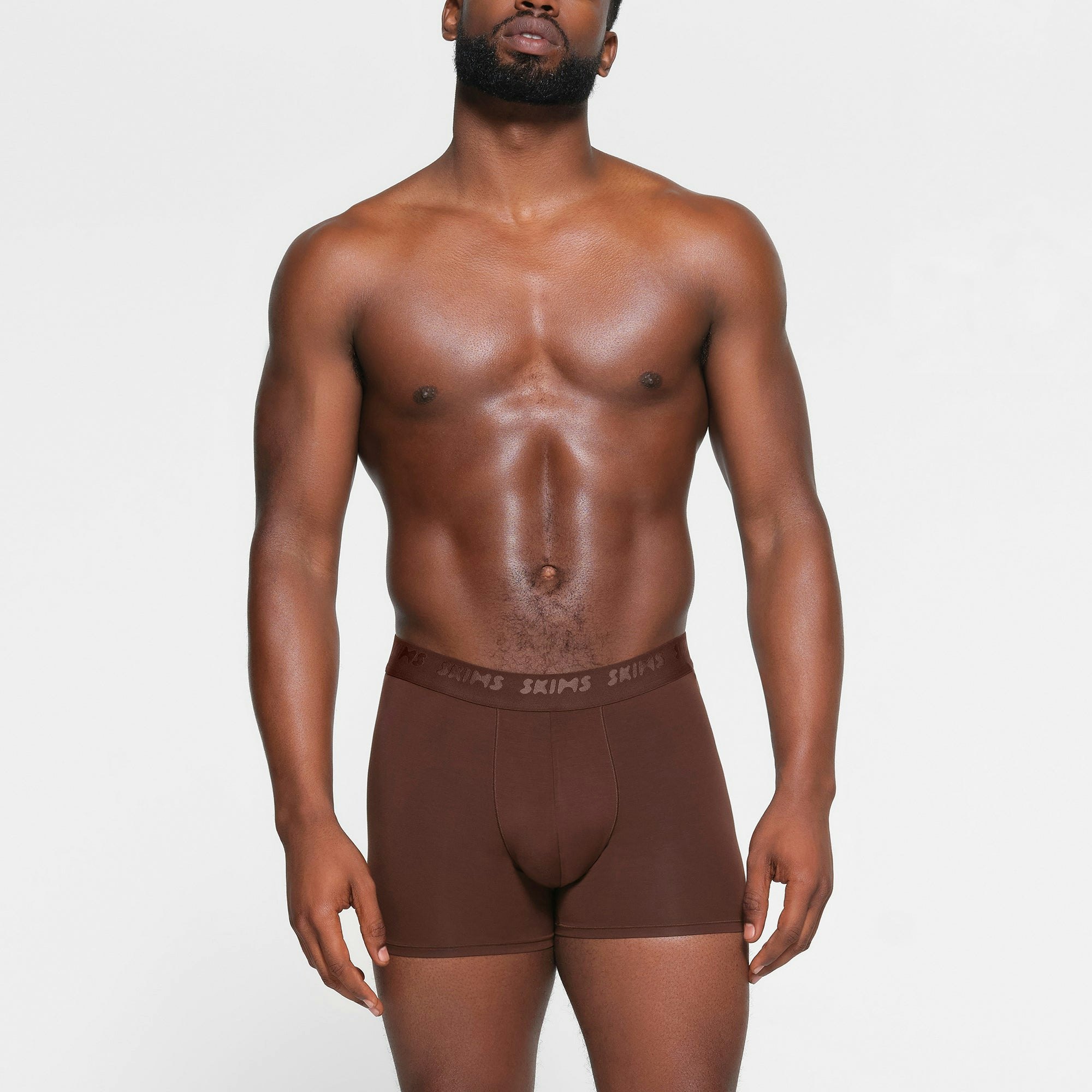 SKIMS STRETCH MENS 3" BOXER BRIEF 3-PACK | DESERT MULTI ON A MODEL FRONT VIEW