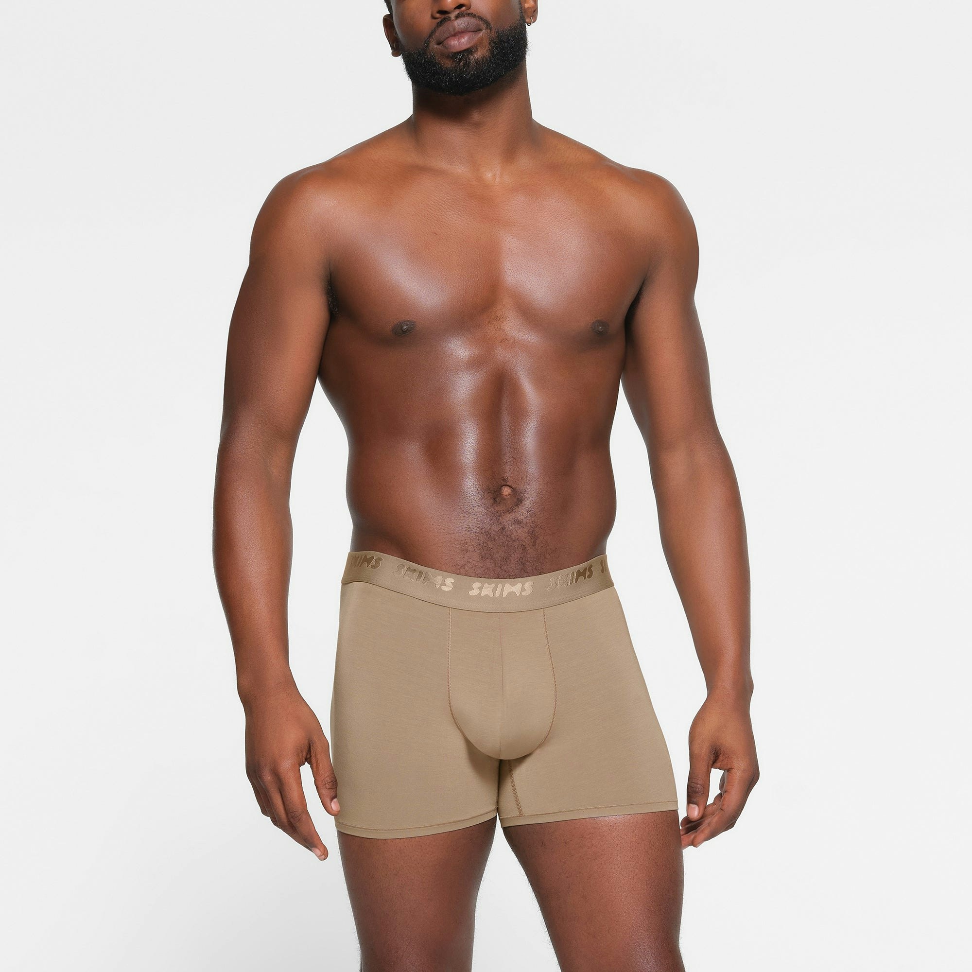 SKIMS STRETCH MENS 3" BOXER BRIEF 3-PACK | DESERT MULTI ON A MODEL FRONT VIEW