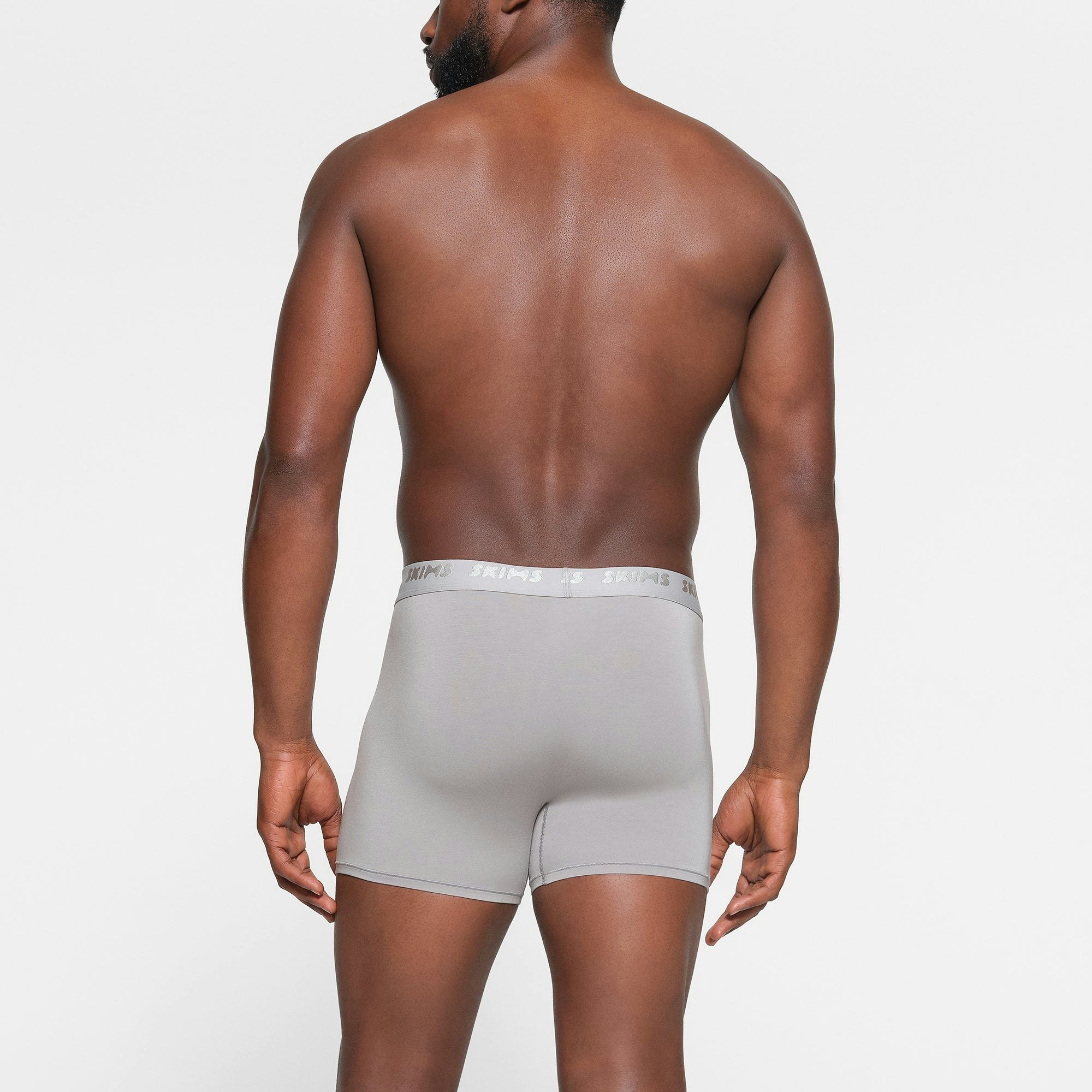 SKIMS STRETCH MENS 3" BOXER BRIEF 3-PACK ON A MODEL BACK VIEW