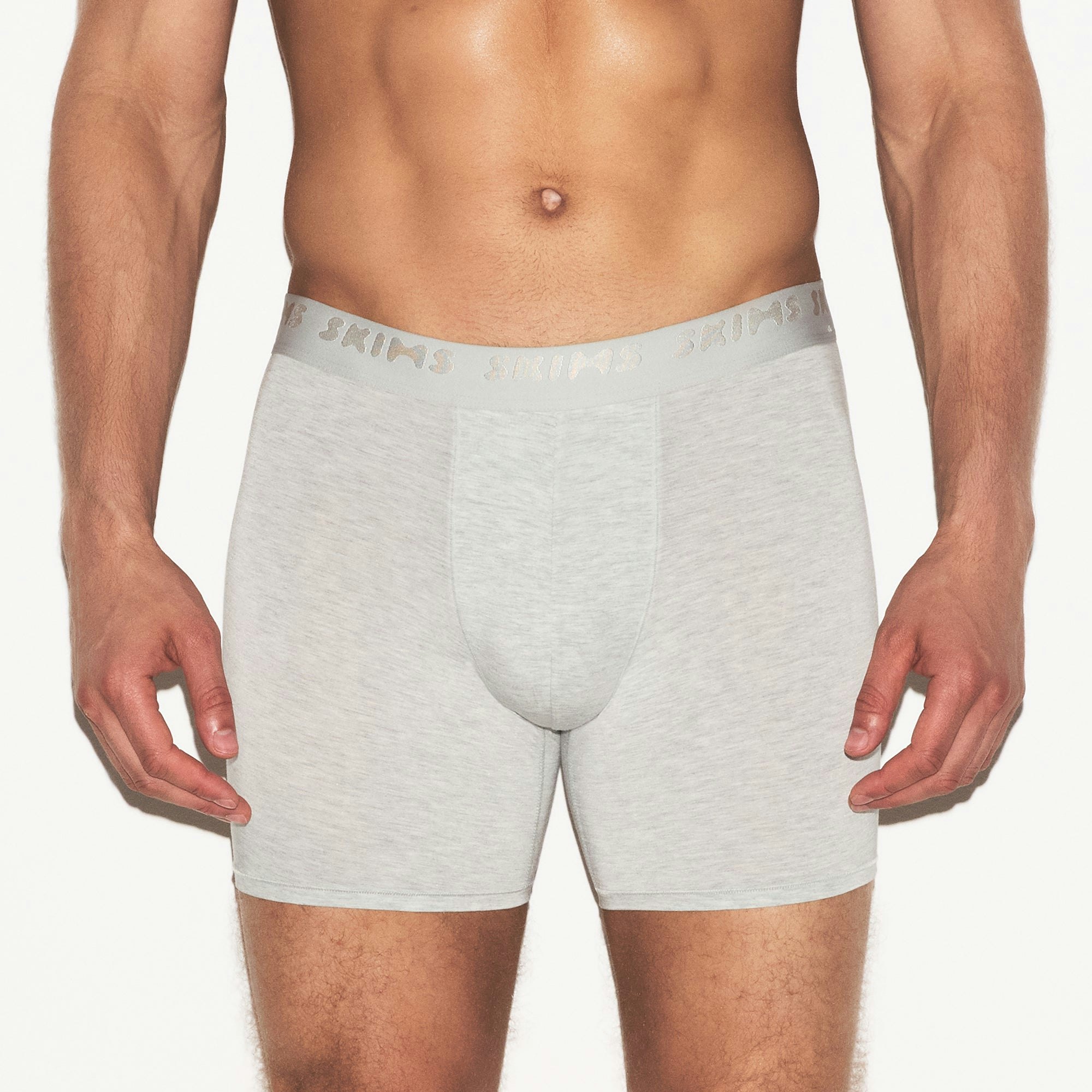 SKIMS STRETCH MENS 3 INCH BOXER BRIEF 3-PACK | LAUREL MULTI ON A MODEL SIDE VIEW | FOCUS: 0.0, 1.0, 0.9
