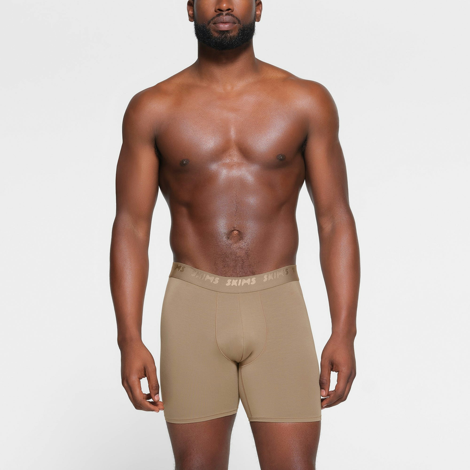 SKIMS STRETCH MENS 5" BOXER BRIEF 3-PACK | DESERT MULTI ON A MODEL FRONT VIEW