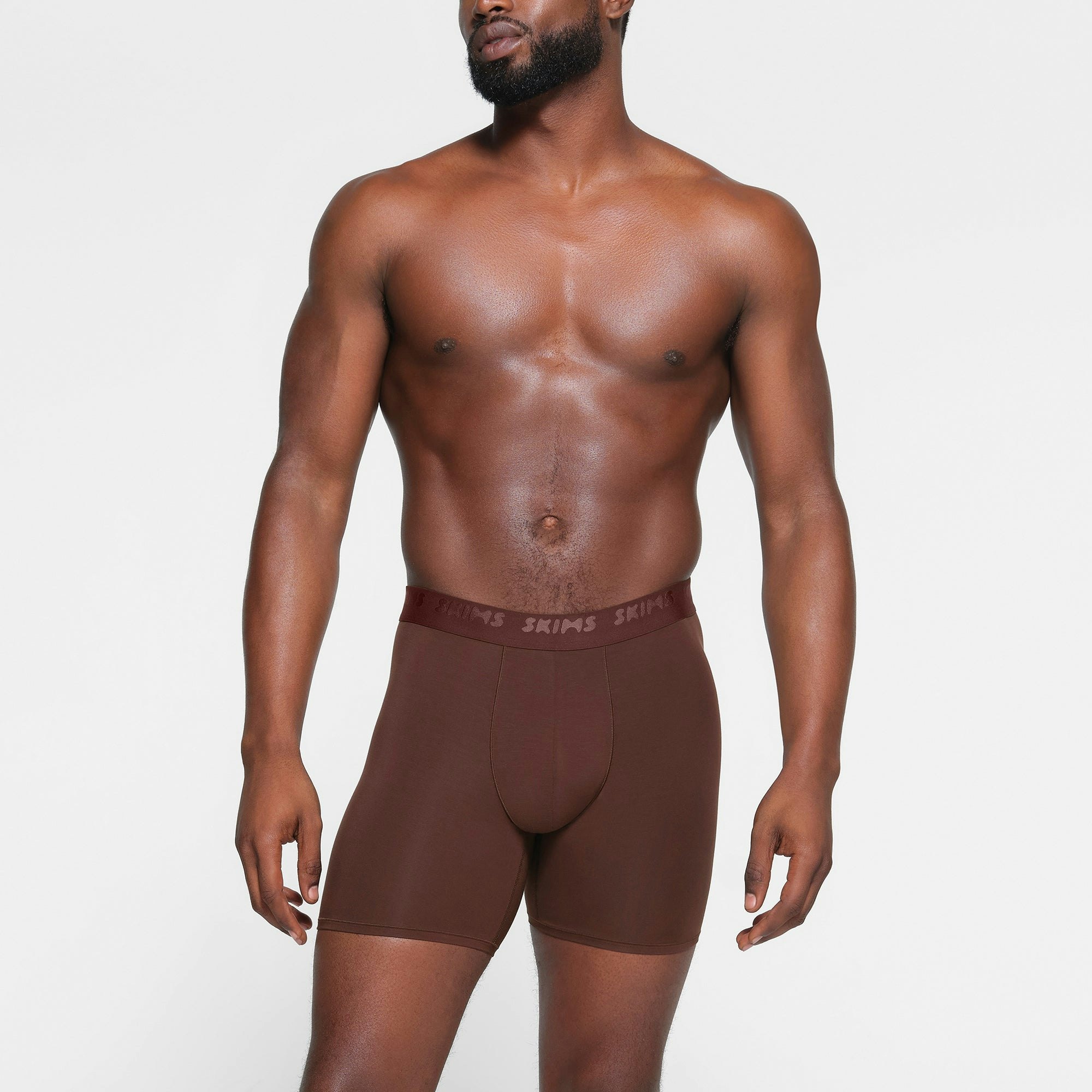 SKIMS STRETCH MENS 5" BOXER BRIEF 3-PACK | DESERT MULTI ON A MODEL FRONT VIEW