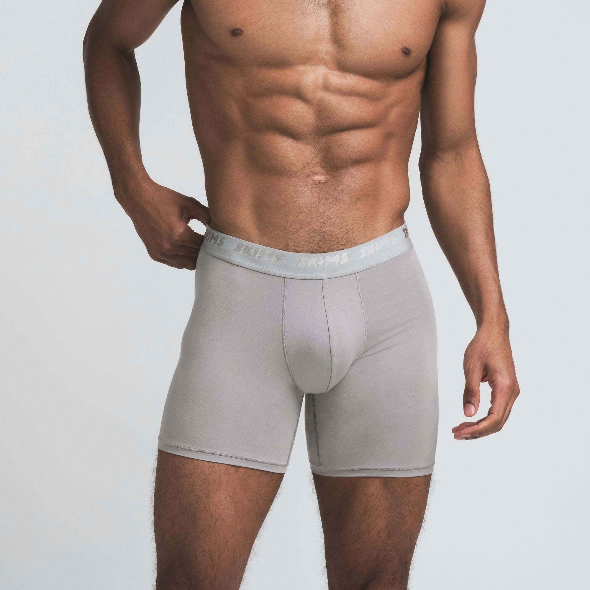 SKIMS STRETCH MENS 5 INCH BOXER BRIEF 3-PACK | INDIGO MULTI ON A MODEL FRONT VIEW | FOCUS: 0.0, 1.0, 0.9