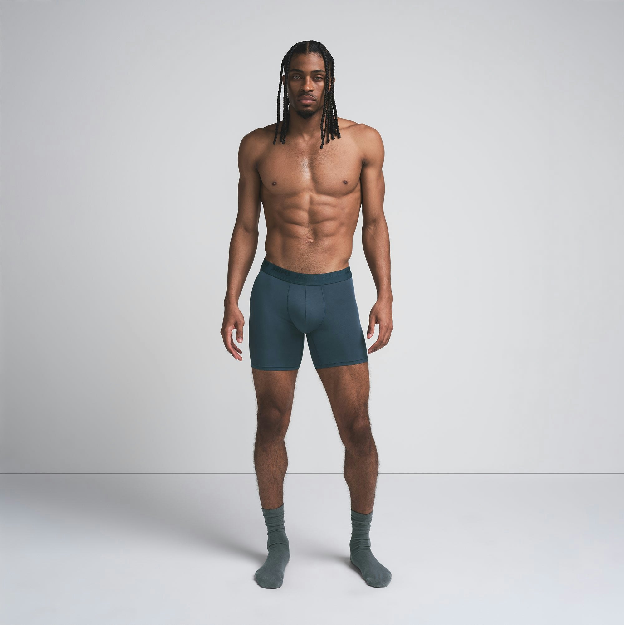 SKIMS STRETCH MENS 5 INCH BOXER BRIEF 3-PACK | INDIGO MULTI ON A MODEL FRONT VIEW | FOCUS: 0.0, 1.0, 0.9