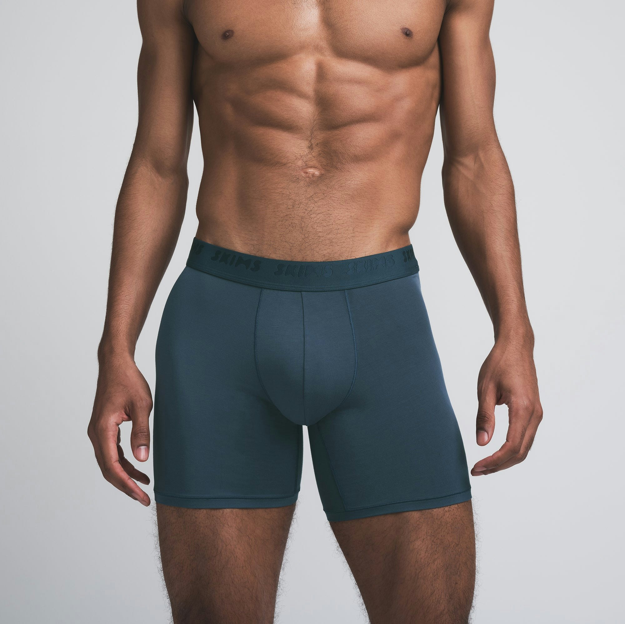 SKIMS STRETCH MENS 5 INCH BOXER BRIEF 3-PACK | INDIGO MULTI ON A MODEL FRONT VIEW | FOCUS: 0.0, 1.0, 0.9
