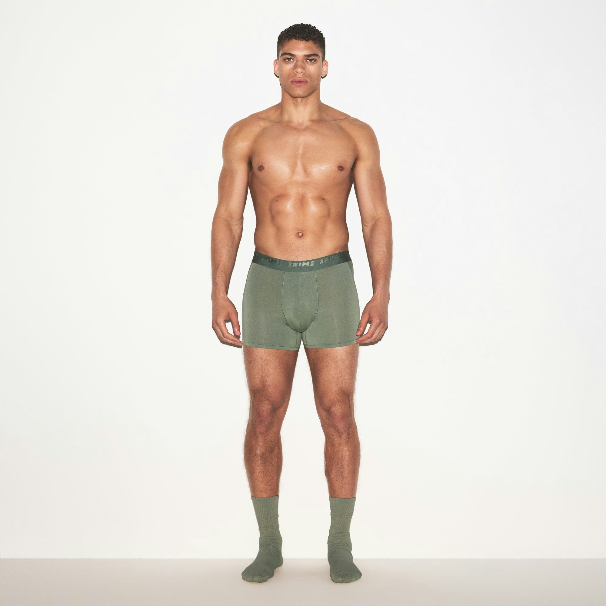 SKIMS STRETCH MENS 3" BOXER BRIEF 3-PACK | LAUREL MULTI ON A MODEL FRONT VIEW | FOCUS: 0.0, 1.0, 0.9