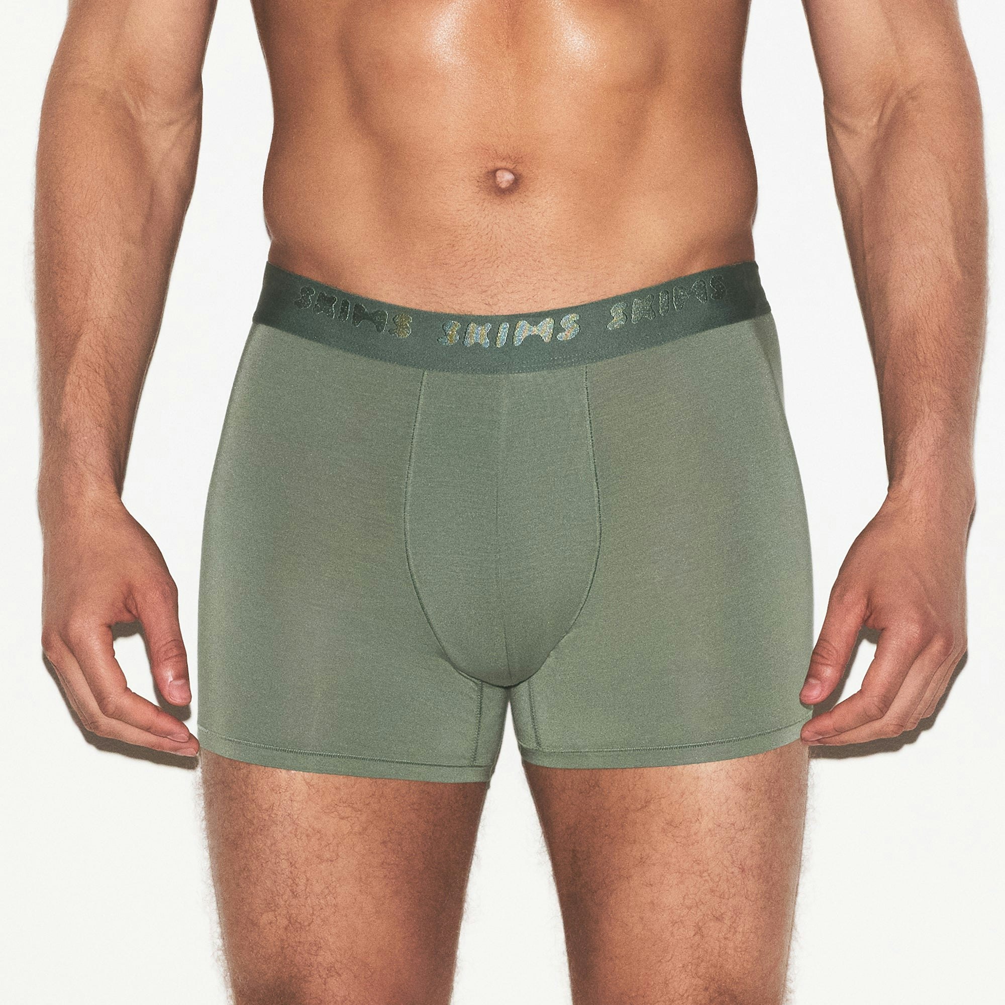 SKIMS STRETCH MENS 3" BOXER BRIEF 3-PACK | LAUREL MULTI ON A MODEL FRONT VIEW | FOCUS: 0.0, 1.0, 0.9