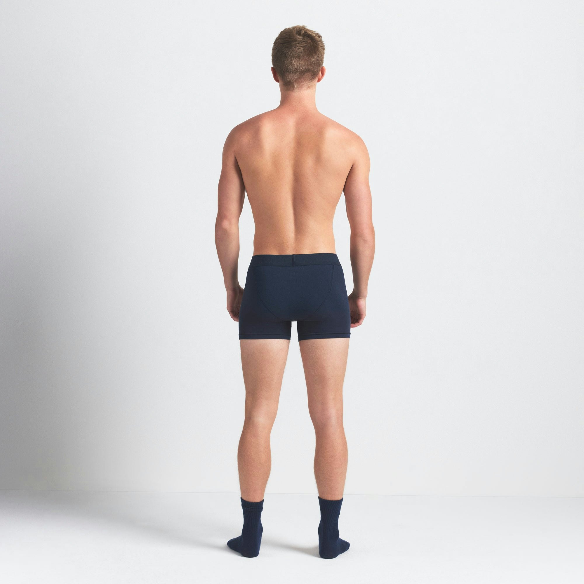 SKIMS COTTON MENS 3" BOXER BRIEF 3-PACK | BLUE BLACK MULTI ON A MODEL FRONT VIEW @ | FOCUS: 0.0, 1.0, 0.9