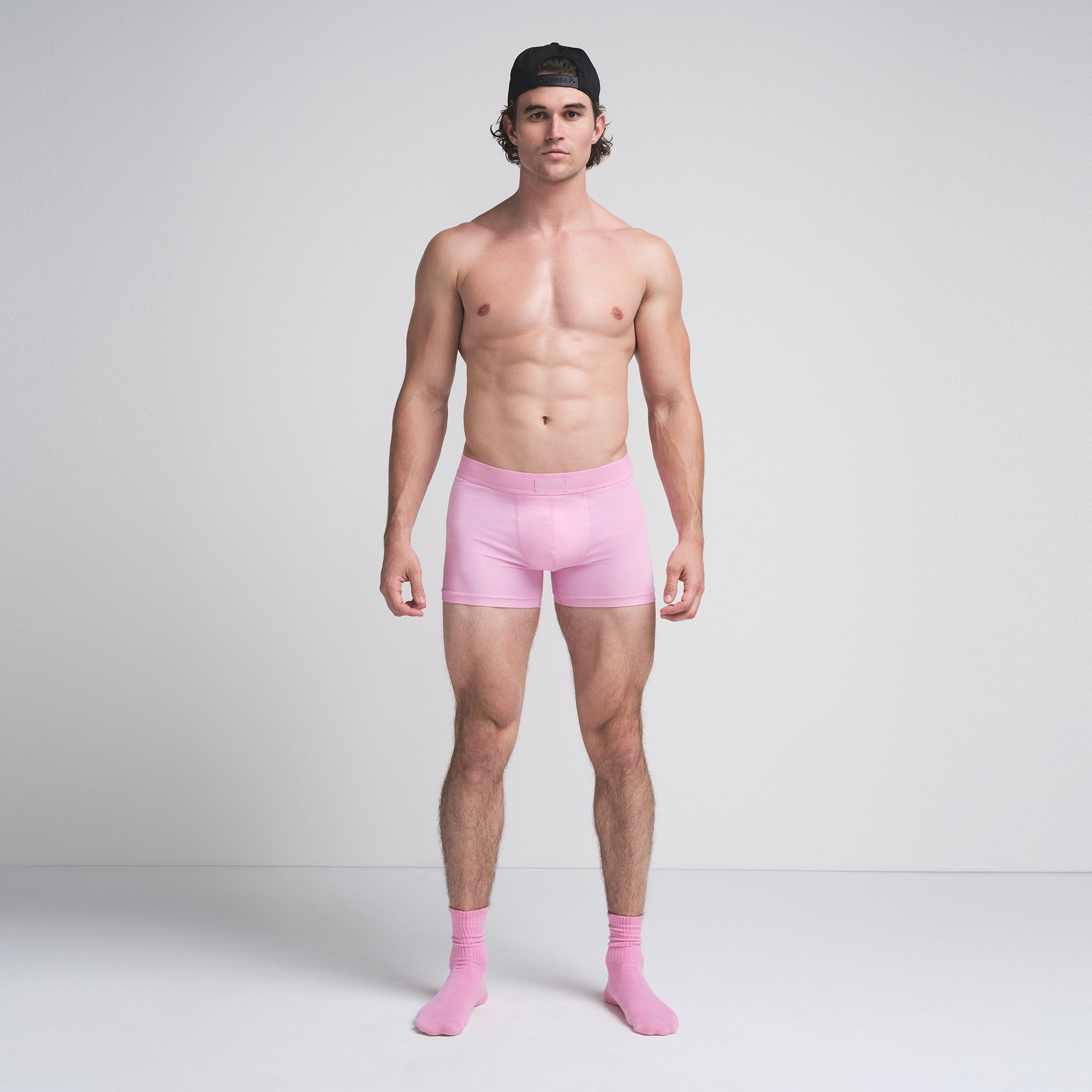 SKIMS COTTON MENS 3" BOXER BRIEF 3-PACK | BUBBLEGUM UMBER MULTI ON A MODEL FRONT VIEW | FOCUS: 0.9, 0.9, 0.9