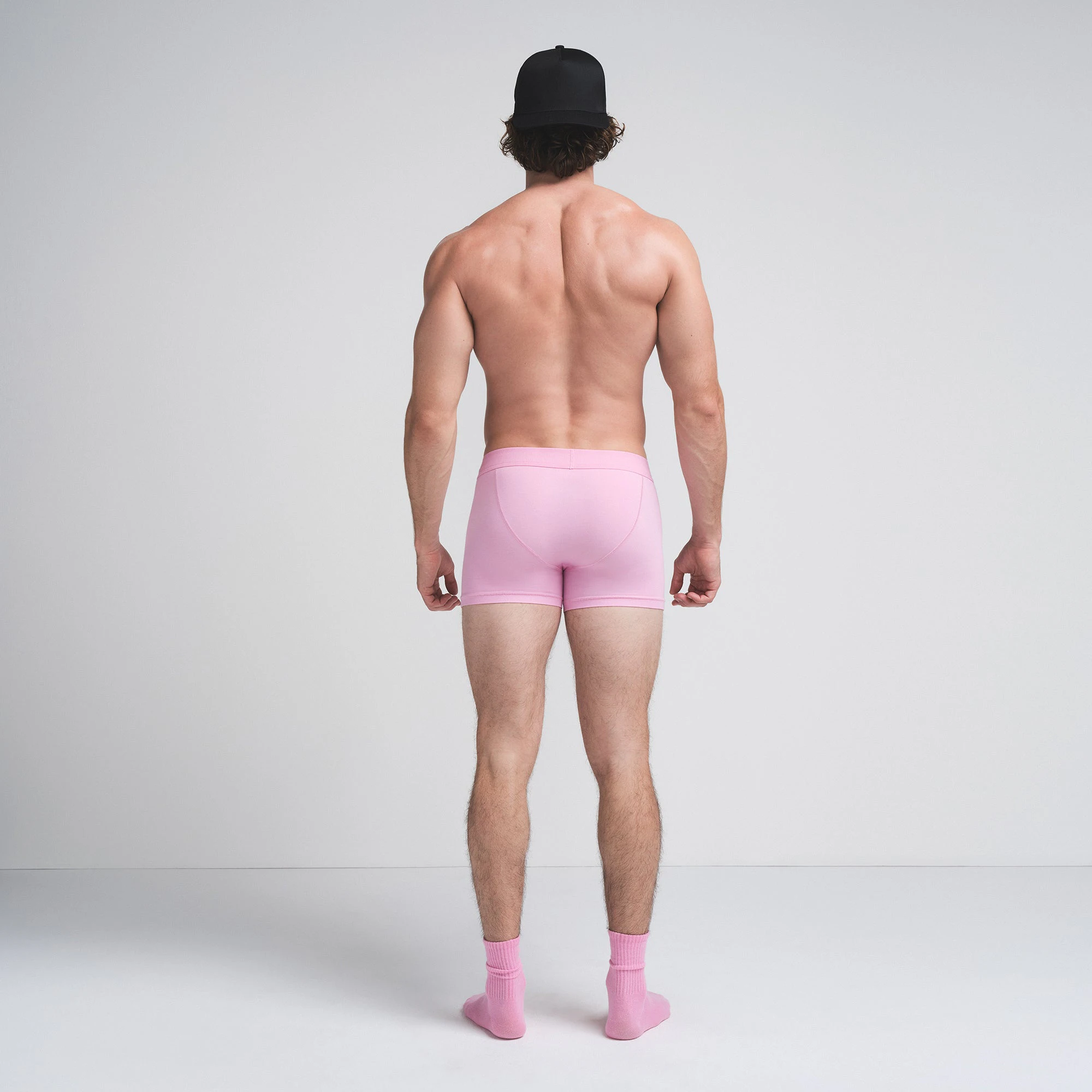 SKIMS COTTON MENS 3" BOXER BRIEF 3-PACK | BUBBLEGUM UMBER MULTI ON A MODEL SIDE VIEW | FOCUS: 0.0, 1.0, 0.9