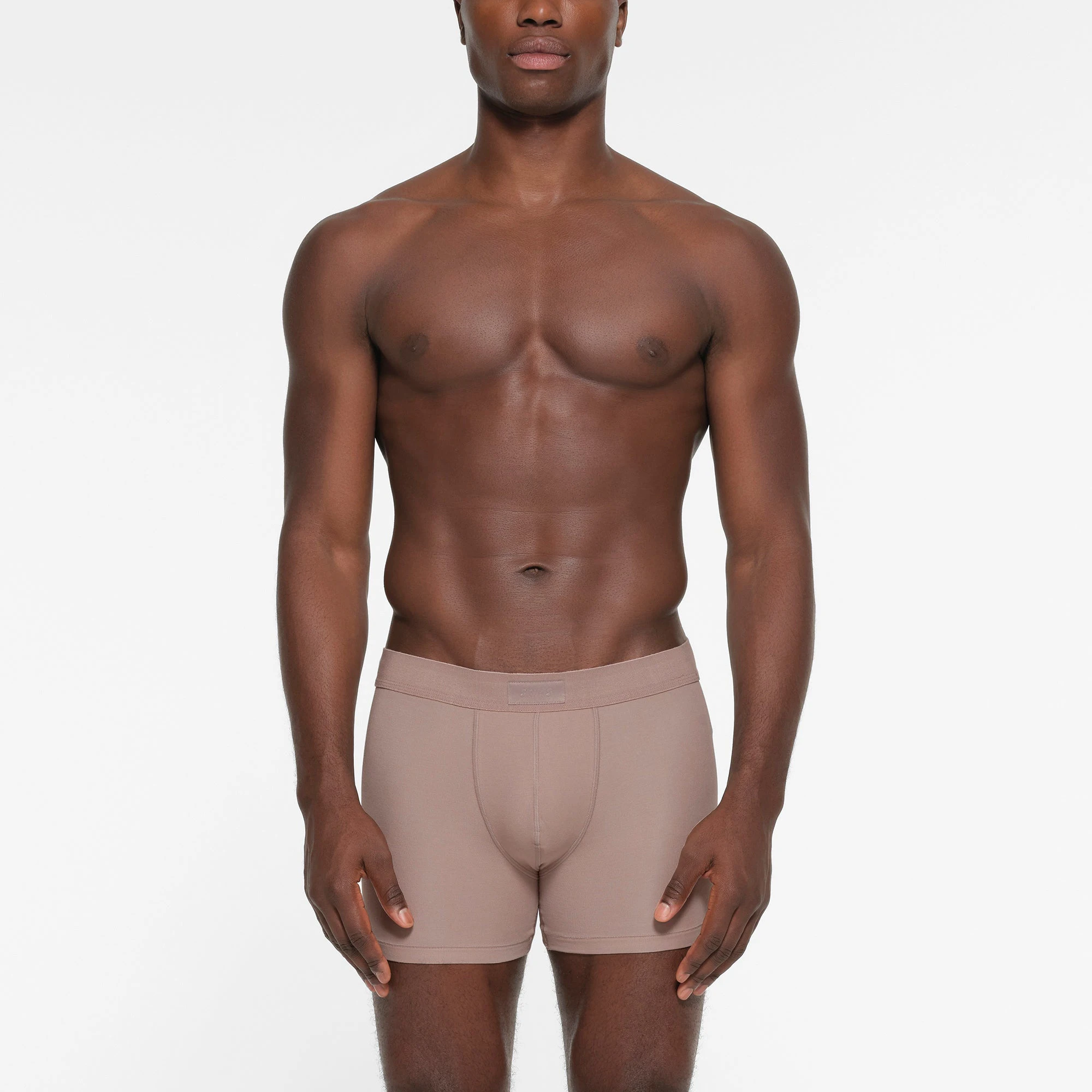 SKIMS COTTON MENS 3 INCH BOXER BRIEF 3-PACK | FAWN MULTI ON A MODEL FRONT VIEW