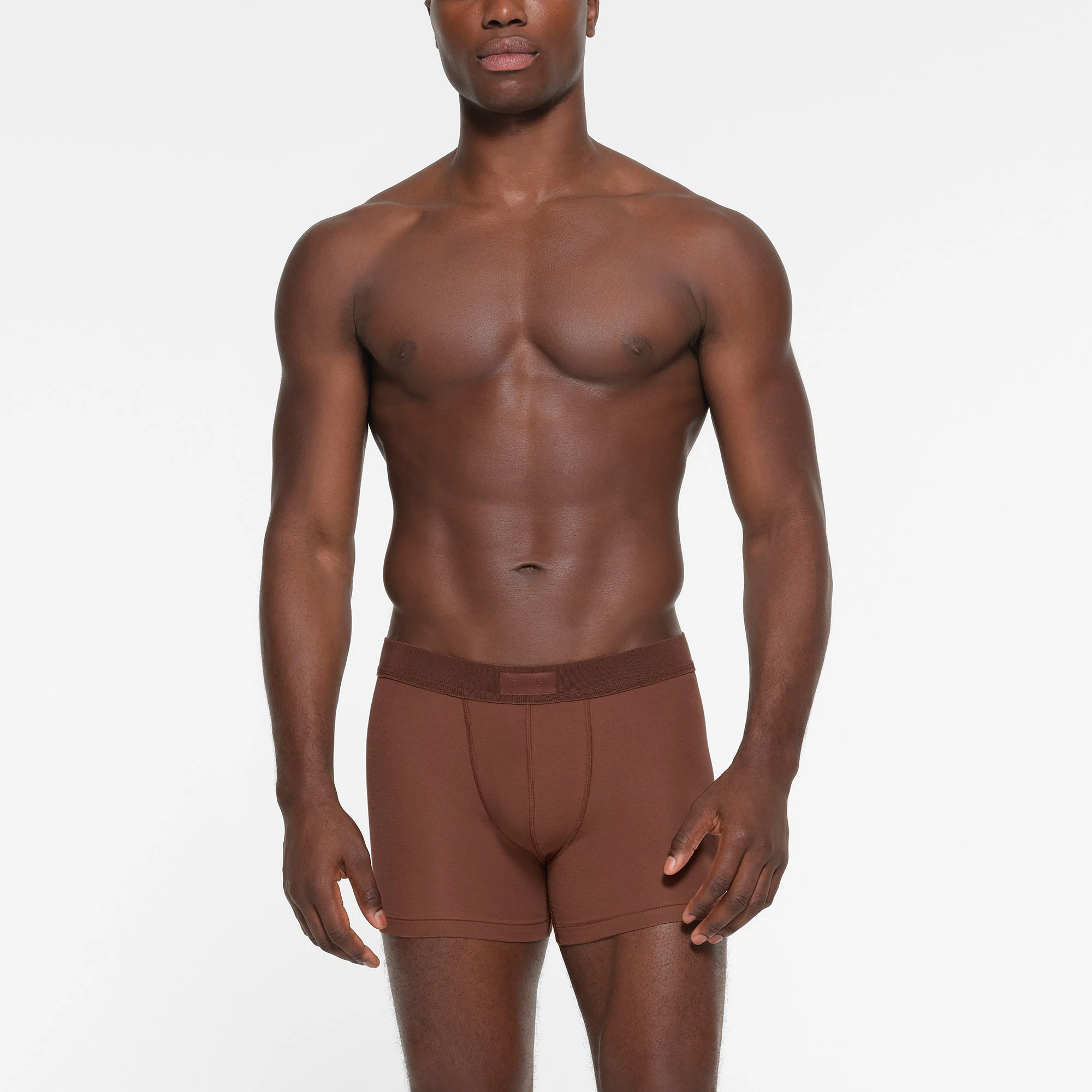 SKIMS COTTON MENS 3 INCH BOXER BRIEF 3-PACK | FAWN MULTI ON A MODEL FRONT VIEW