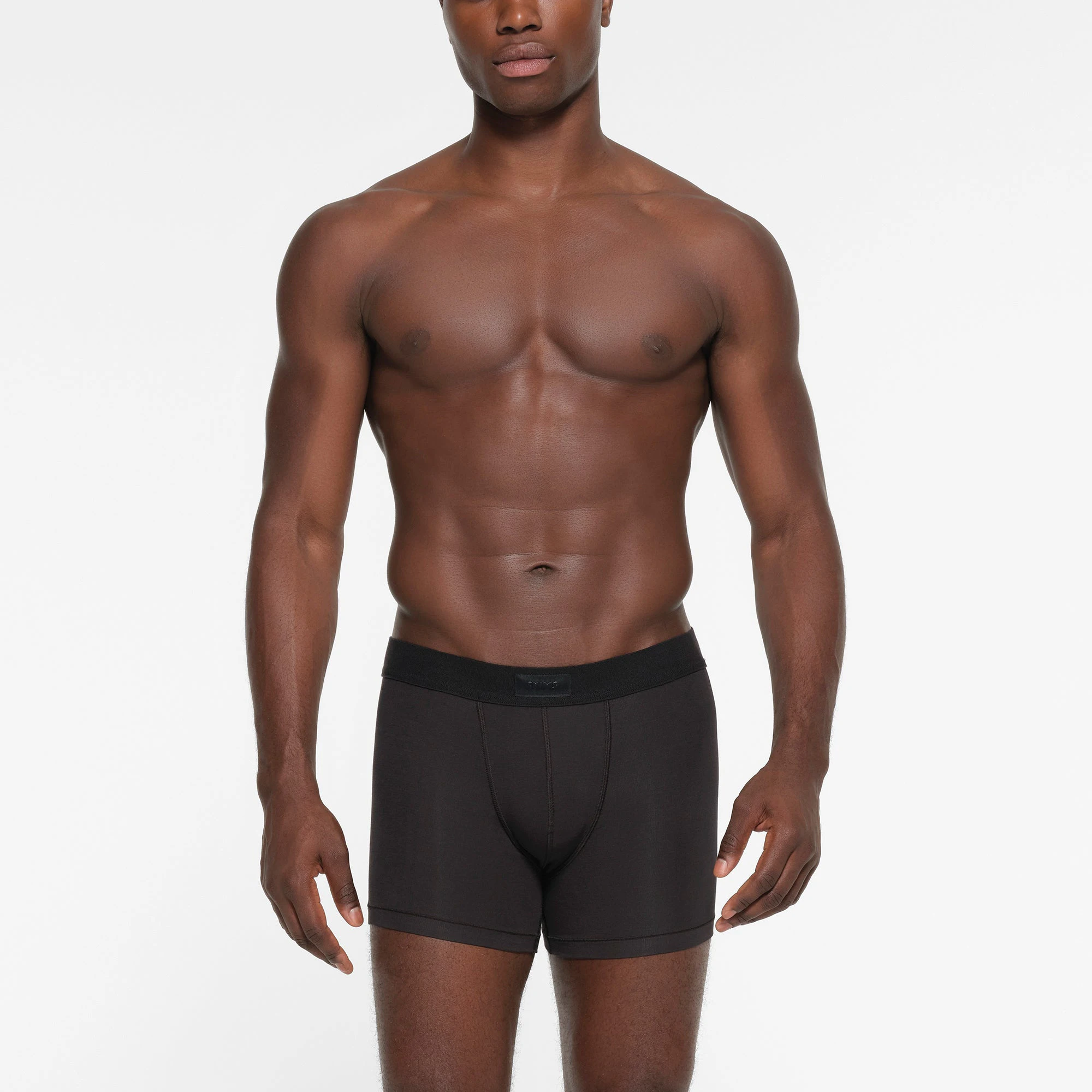 SKIMS COTTON MENS 3 INCH BOXER BRIEF 3-PACK | FAWN MULTI ON A MODEL FRONT VIEW