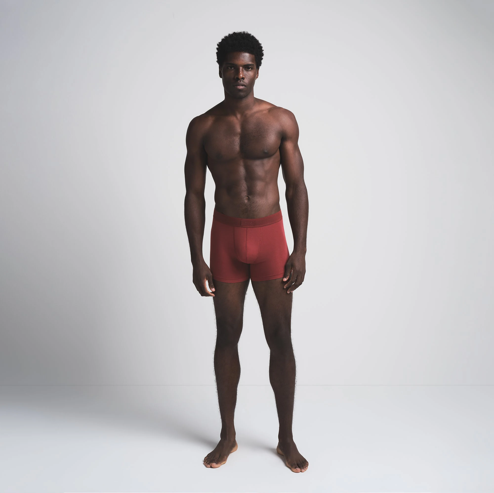 SKIMS COTTON MENS 3" BOXER BRIEF 3-PACK | MERLOT MULTI ON A MODEL FRONT VIEW | FOCUS: 0.0, 1.0, 0.9